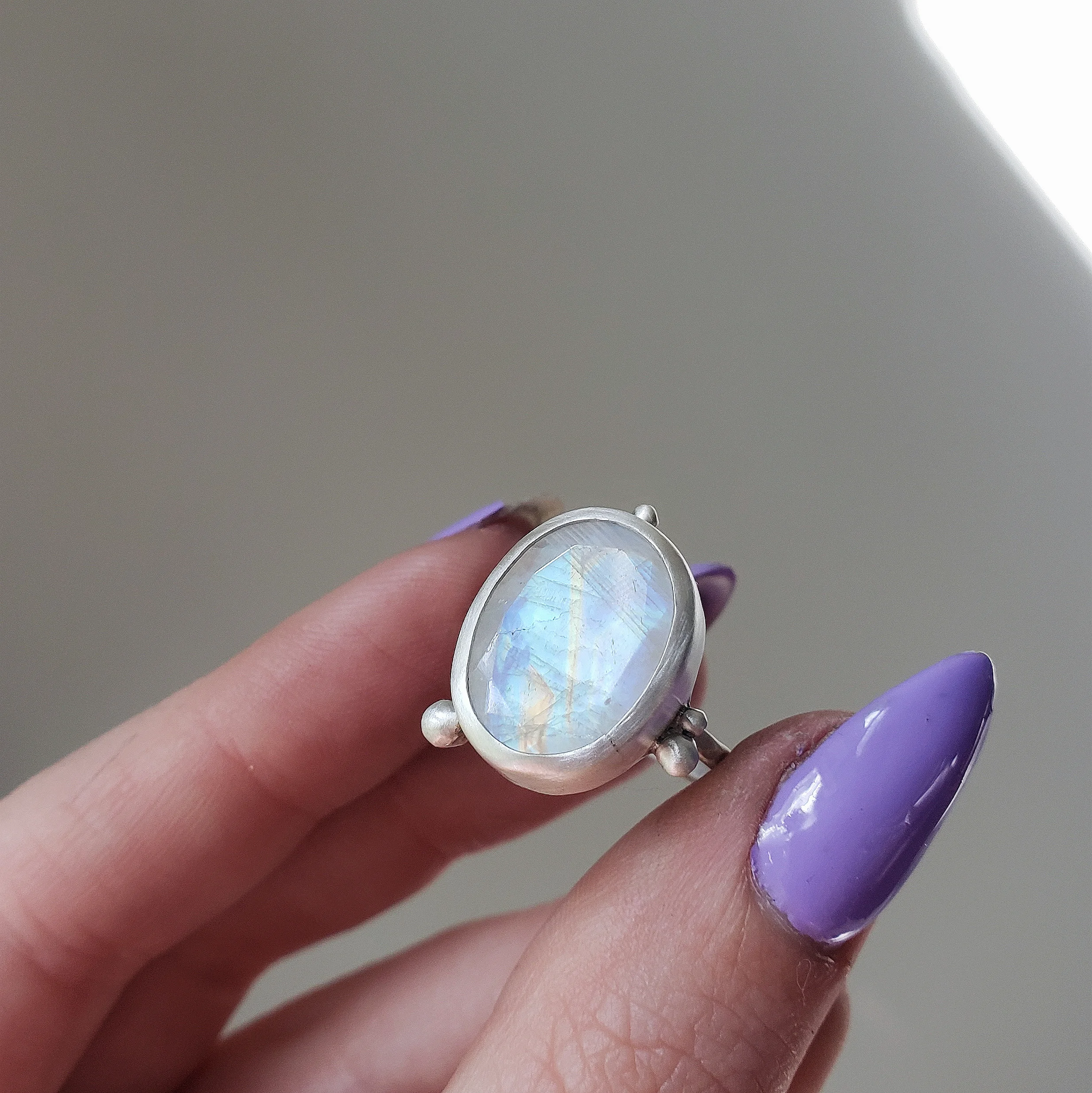 rainbow moonstone dot ring.jpg
