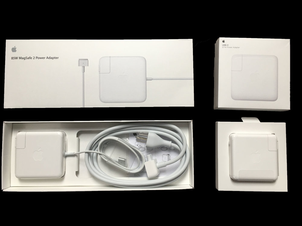 The power supply on the left and power supply on the right both cost 79-dollars. The one on the right is for the new Macbook Pro. It is two watts more, maybe that's why they had to remove all the extra cables.