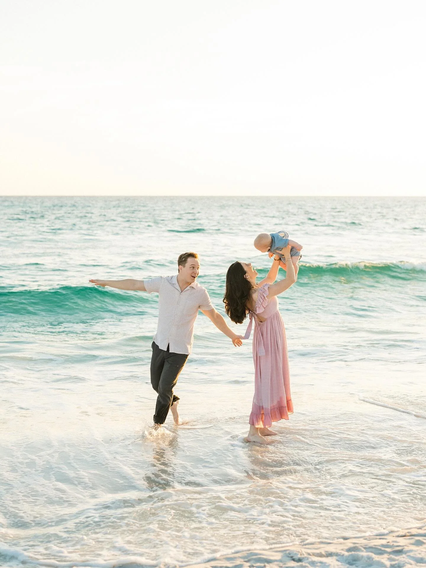 The newest little hitting the beach for the first time! 🌊🌞