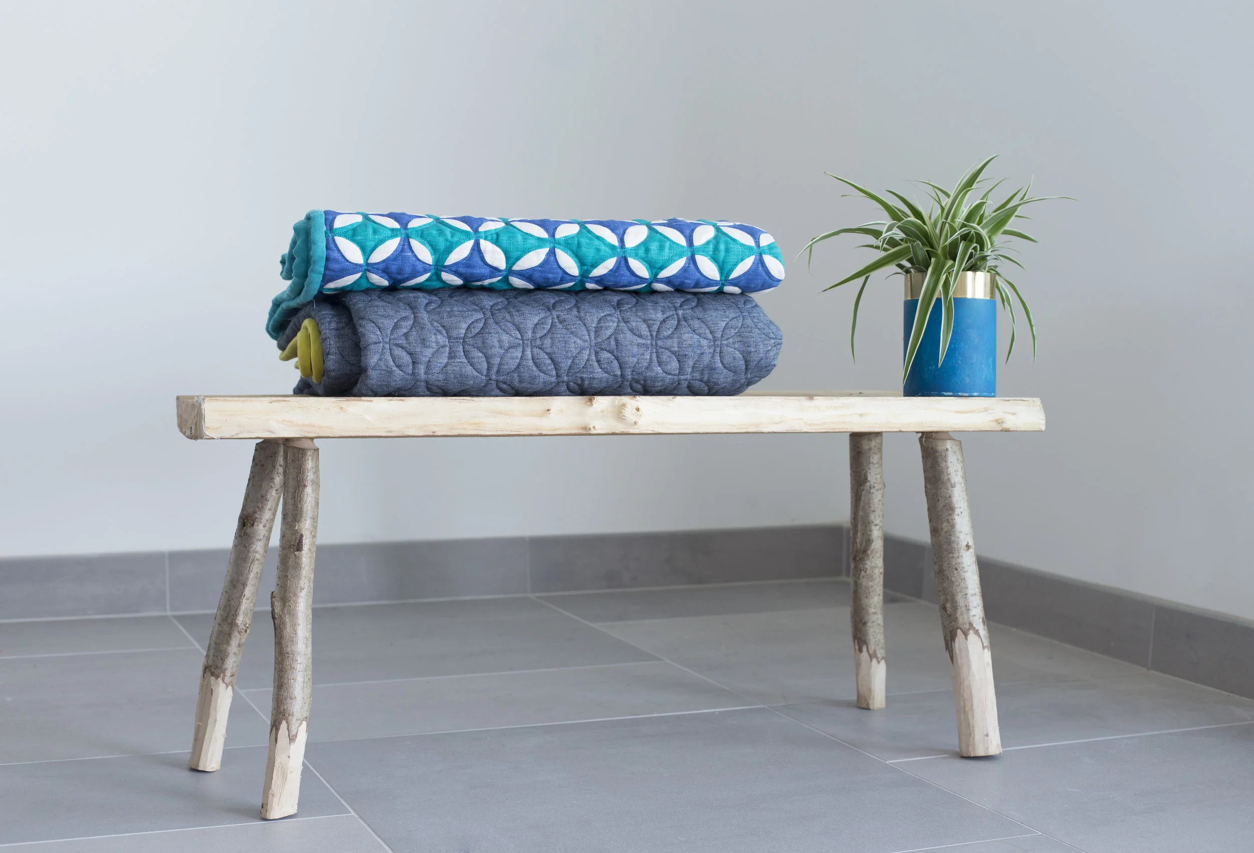 Two quilts on bench.jpg
