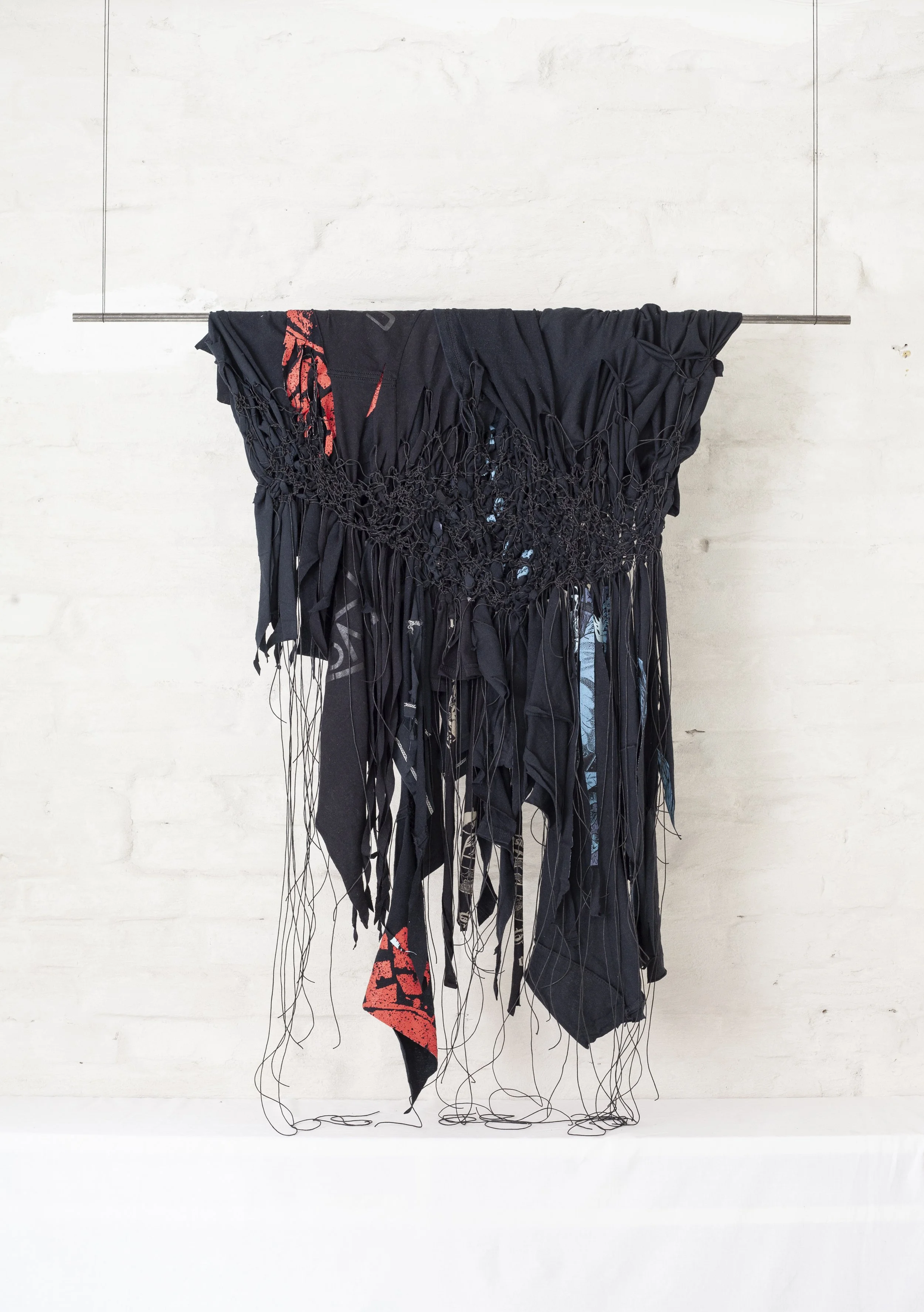 REMAKE, 2025, Hrafnhildur Halldórsdóttir, Selected band t-shirts (2007-2014), waxed cord, metal rod