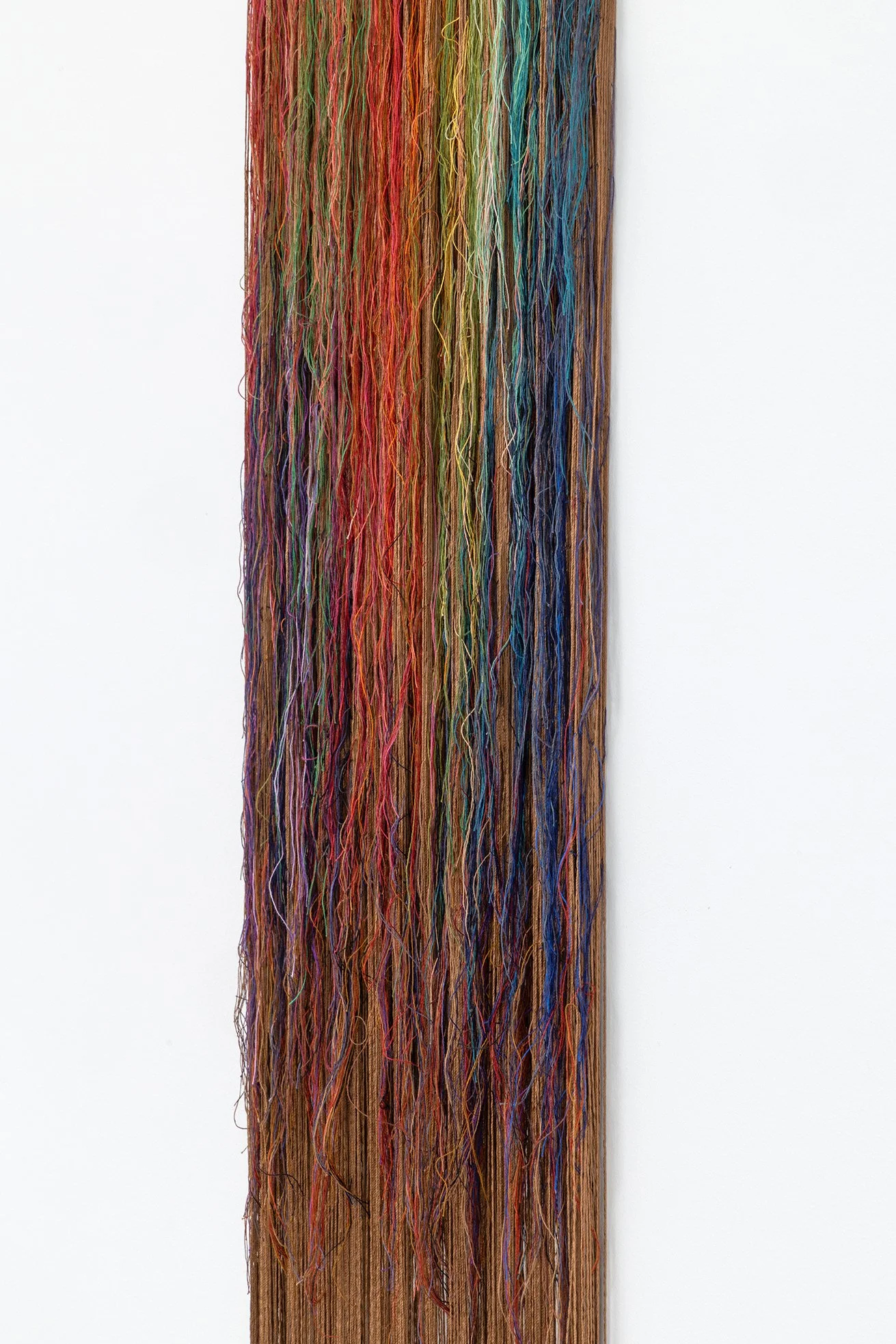 The mountains and everything else   2024    Nylon yarn, brass, wool