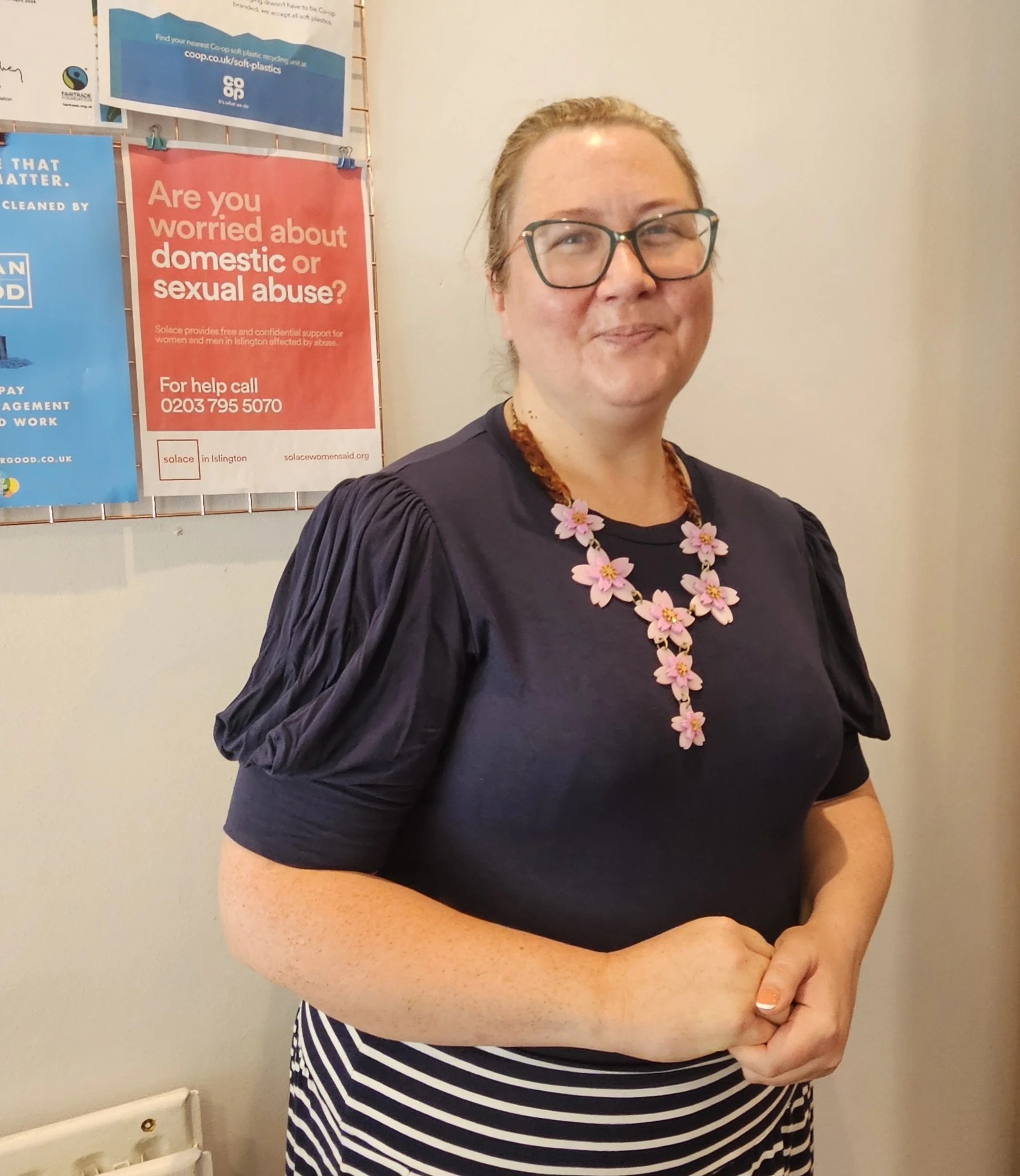 A photo of Gemma West in front of St George's main entryway.