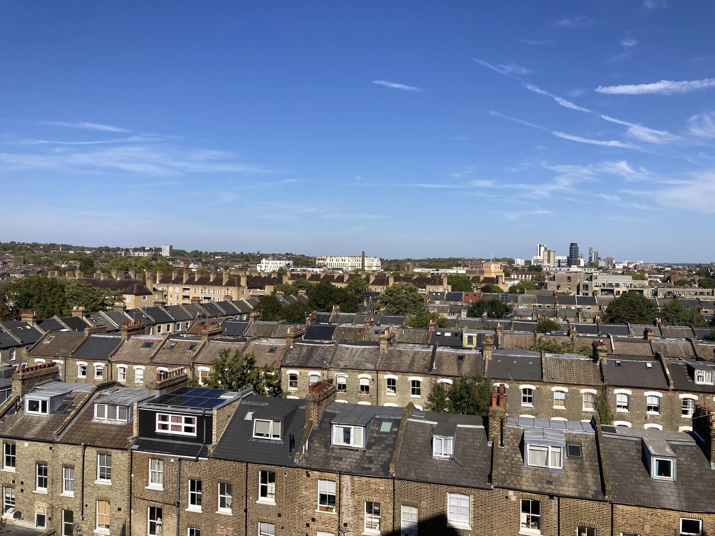 An image of Tufnell Park from a high place that shows the sky and hundreds of houses.