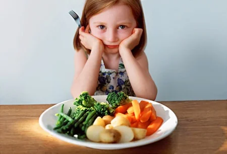 child with vegetables.jpg