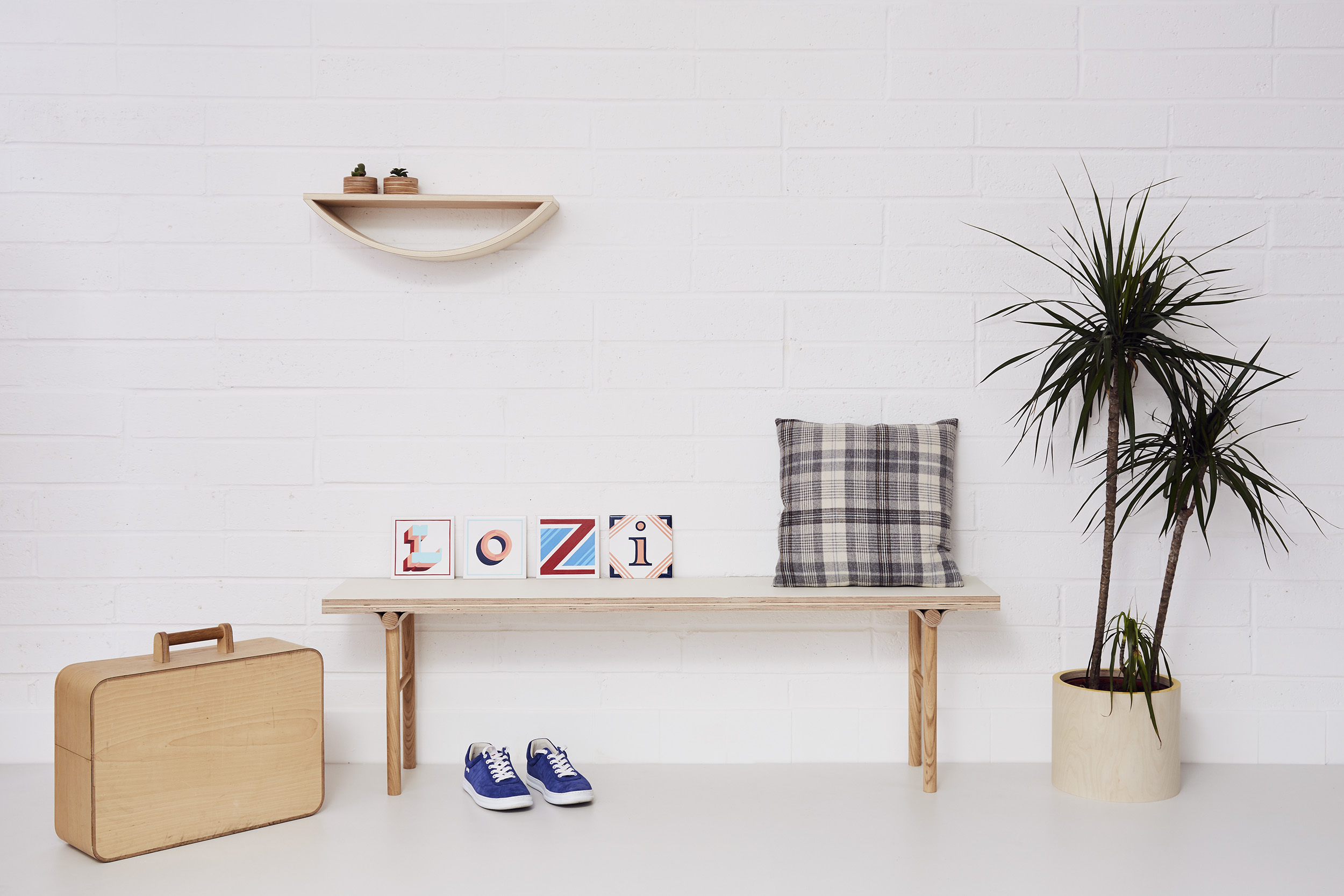 Plywood and oak curved joint bench with accessories by Lozi