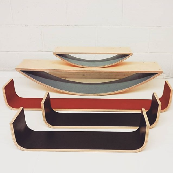 Smile and U shelves in custom colours.