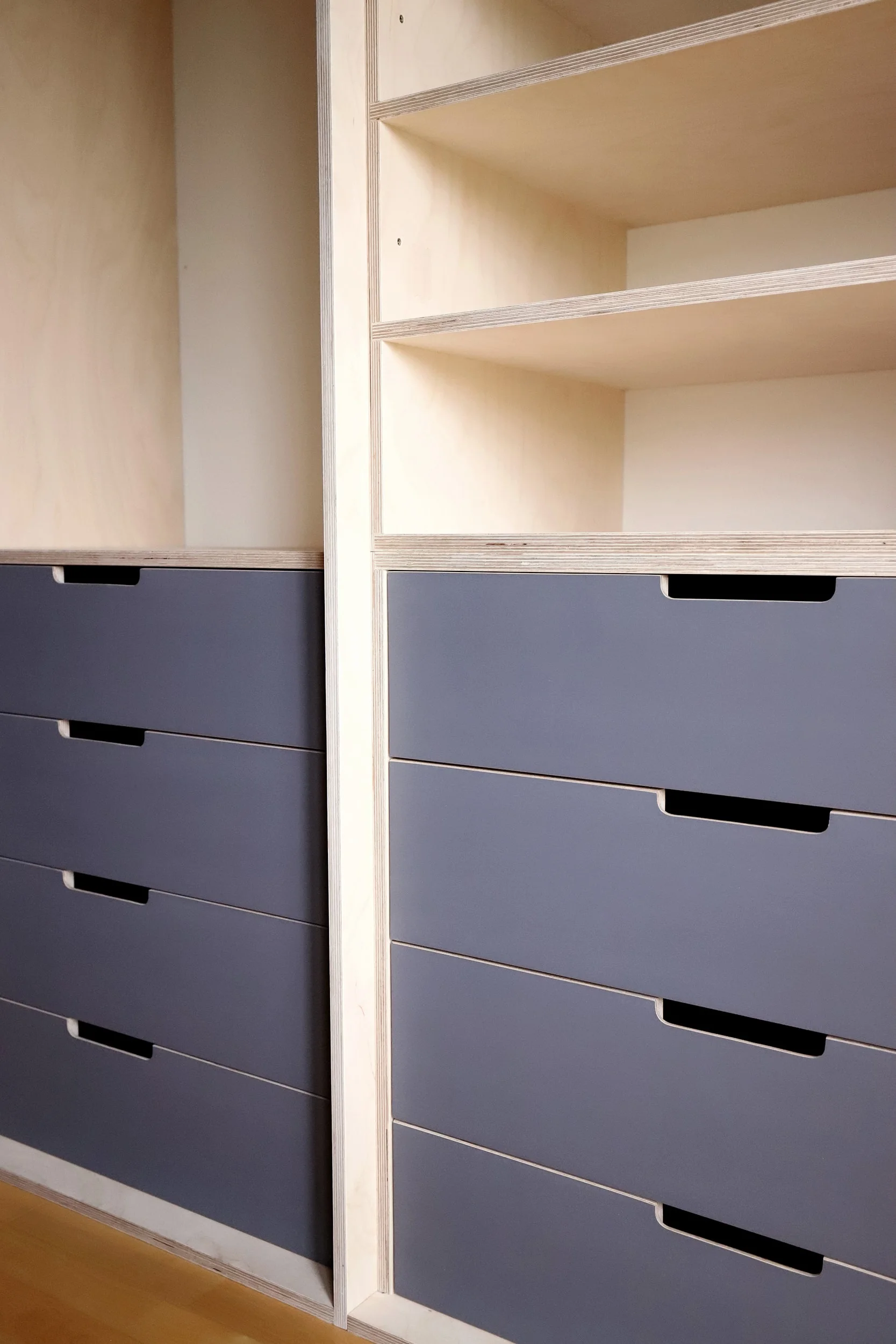 Ample drawer space allows the couple to easily store all their clothing.