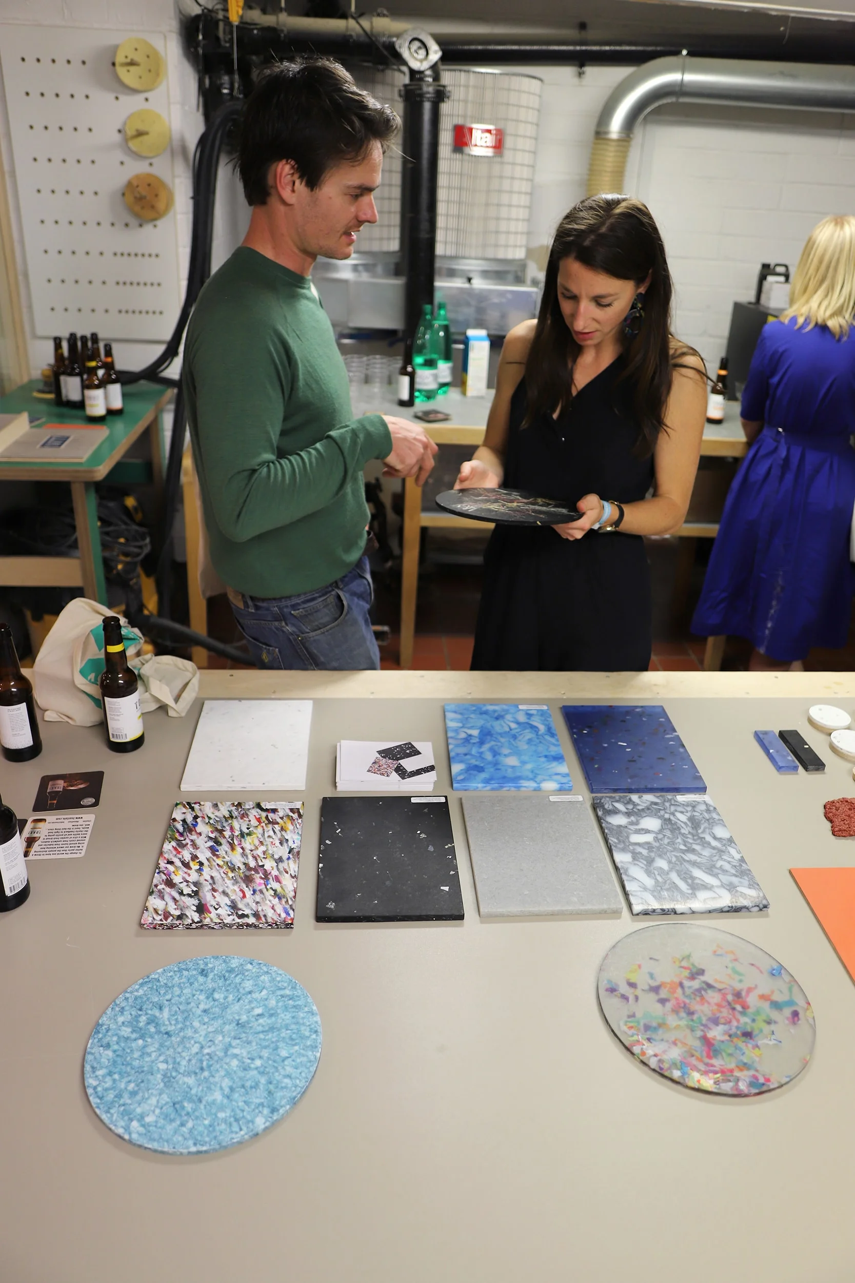 Adam from Smile Plastics talking Helen through his material samples.