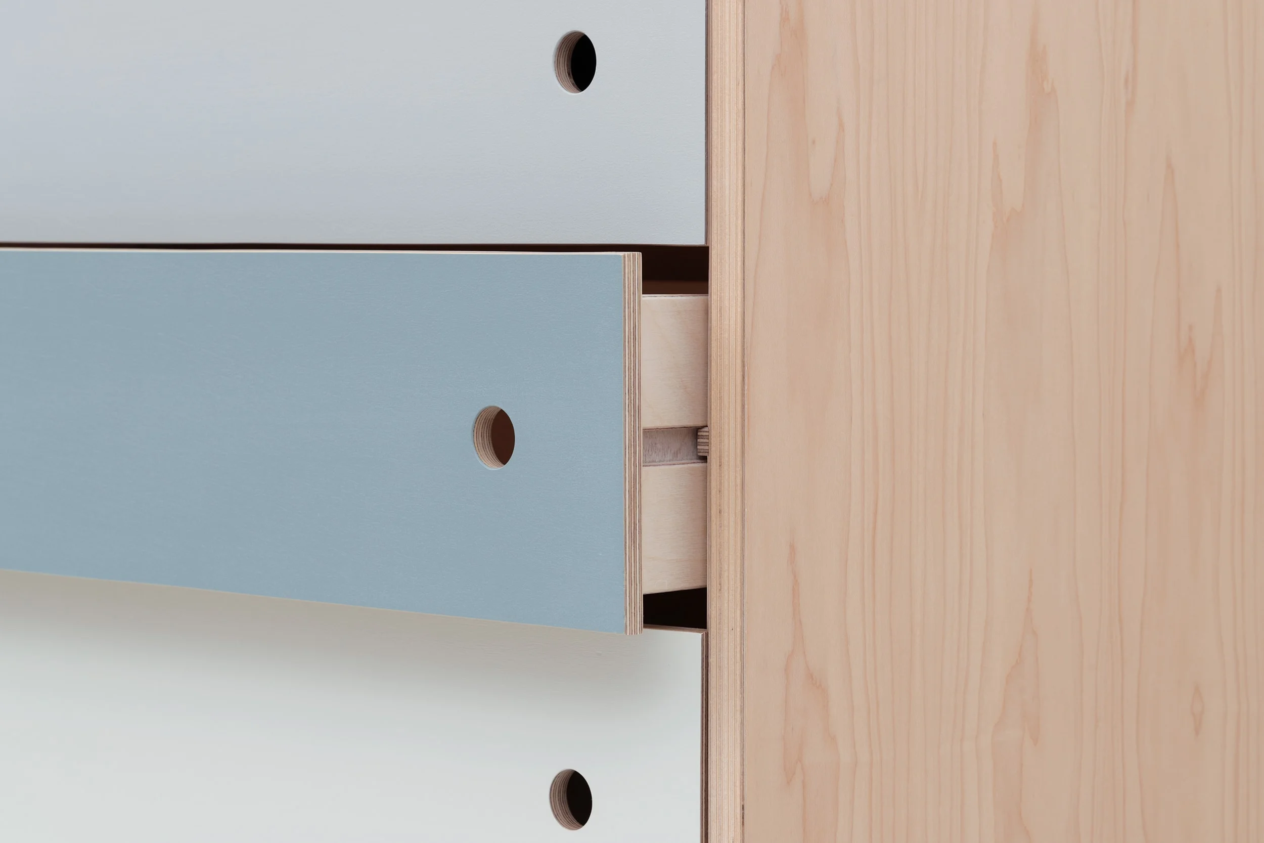 A close up of the drawer from Lozi's plywood chest of drawers.
