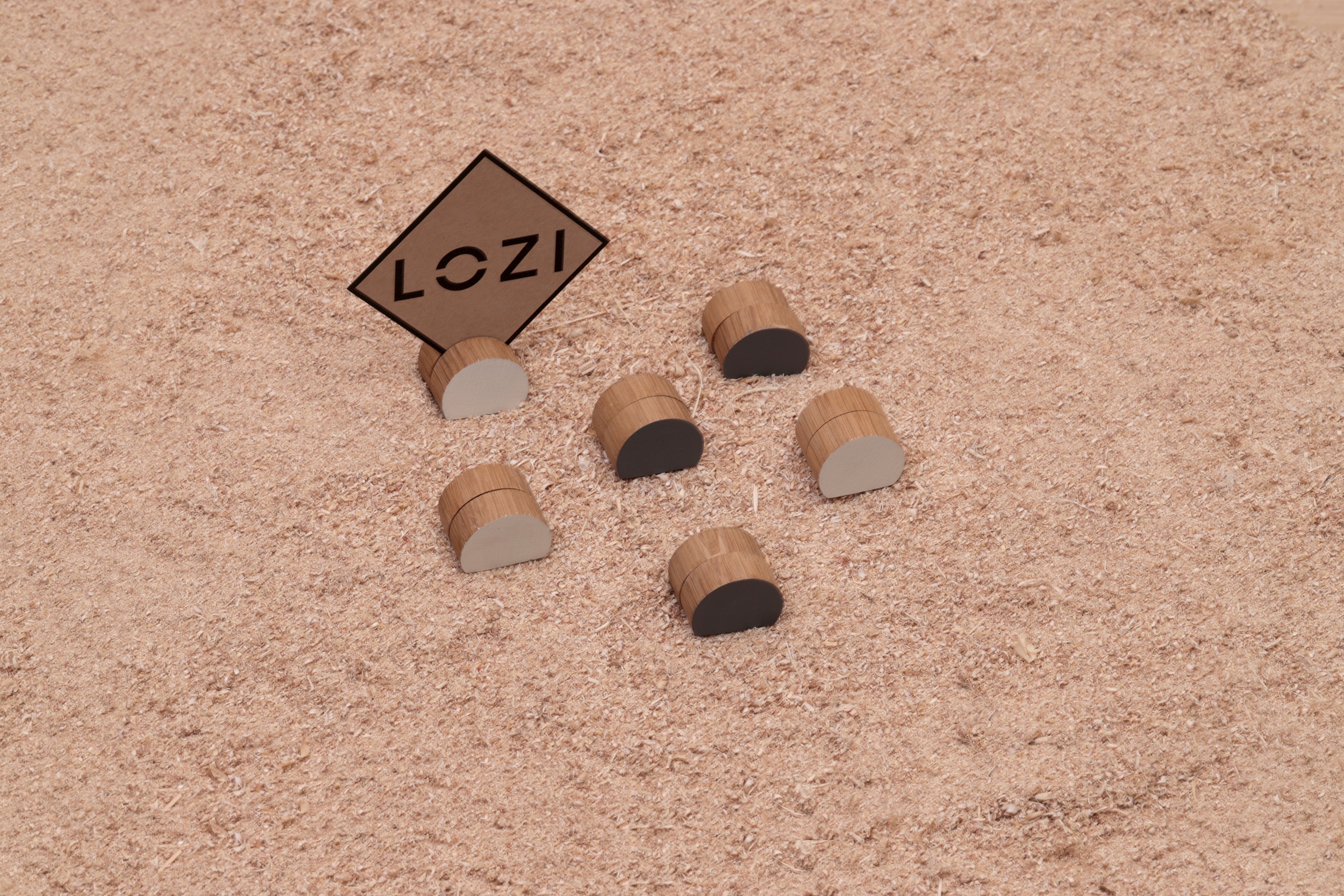 Two sets of picture clicks from Lozi's £9.99 Collection made from waste materials