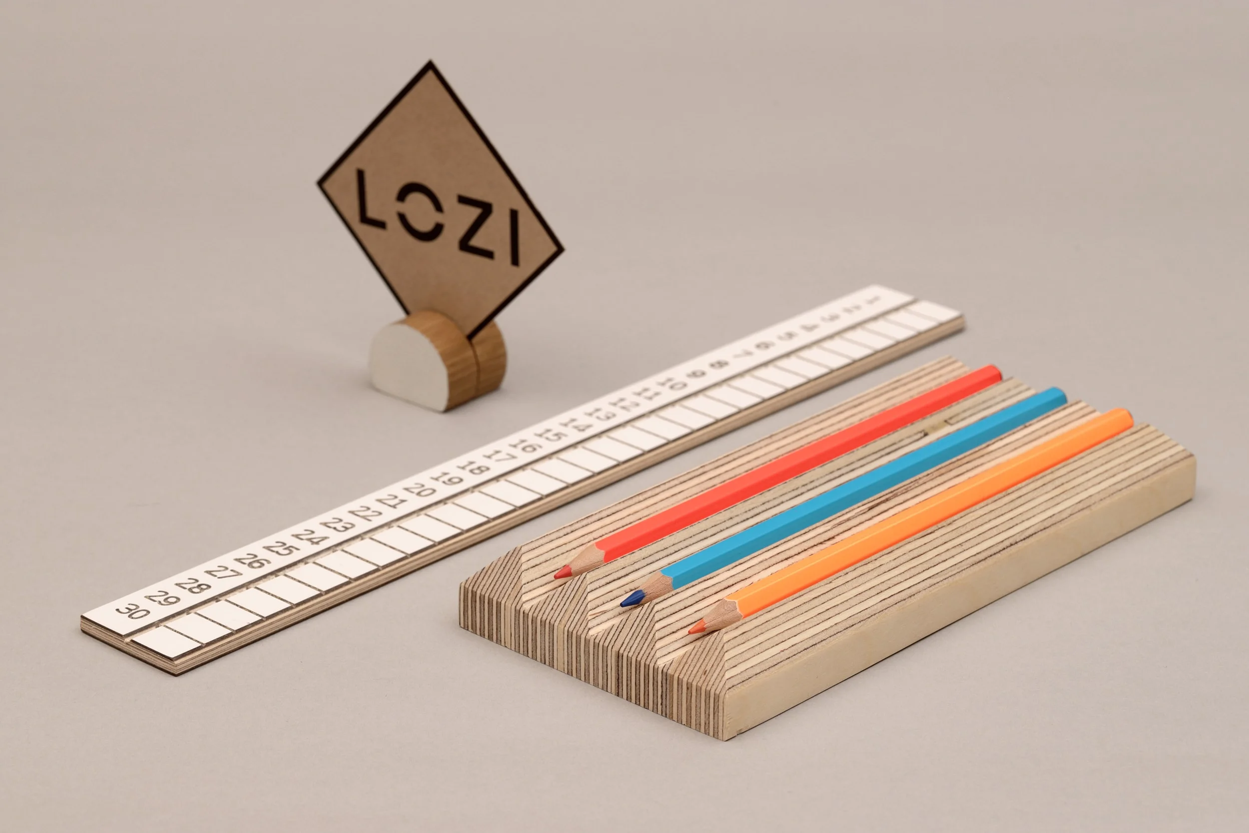 A desk set up made of Magic ruler, pen holder and picture click from Lozi's £9.99 Collection made from waste materials