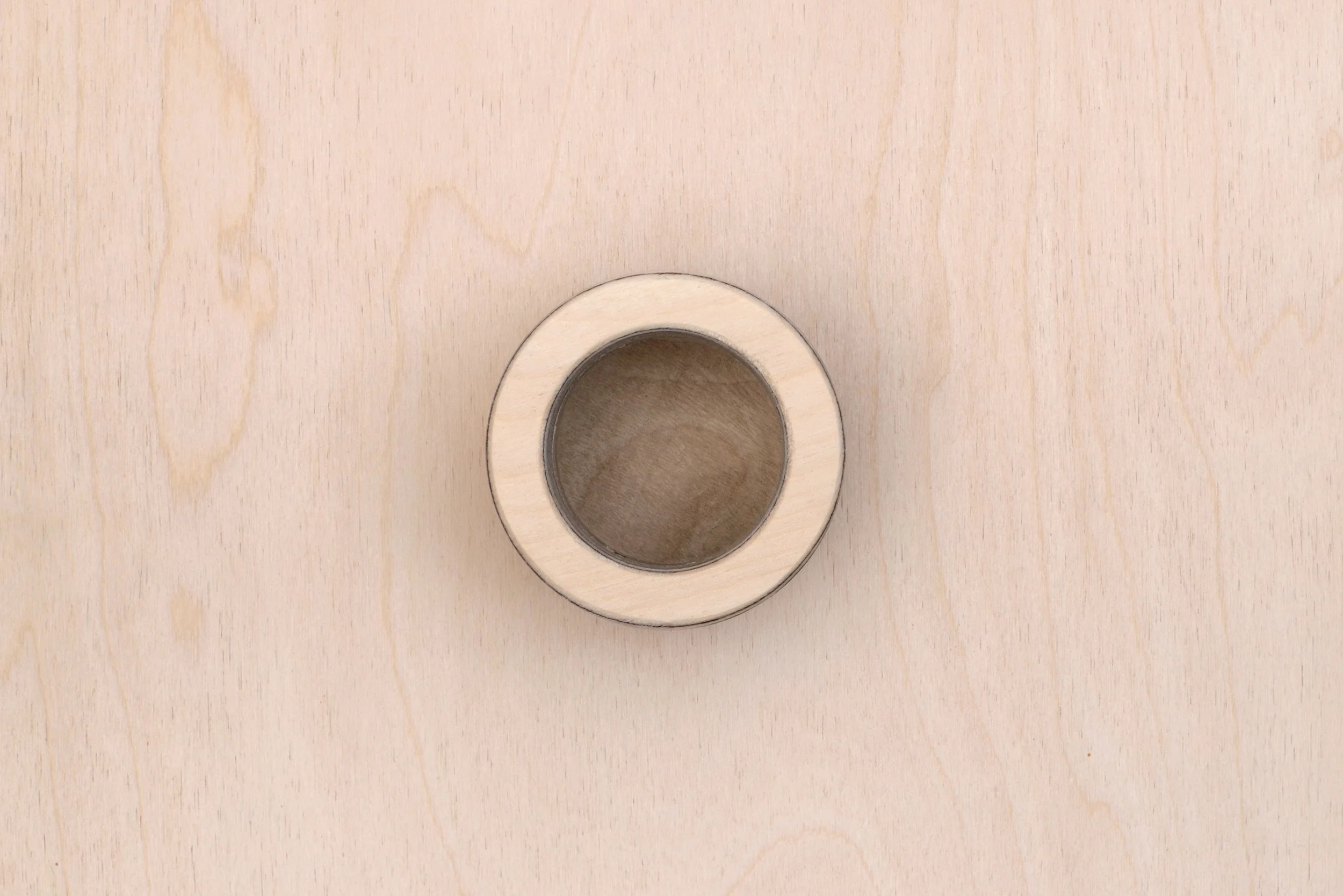 A single mini plant pots from Lozi's £9.99 Collection made from waste materials