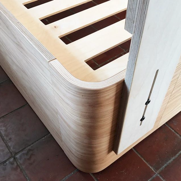 Adjustable headboard from Lozi's curved plywood bedframe