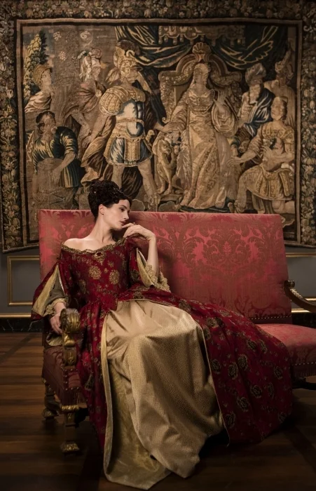 Religious Queen Marie-Therese (Elisa Lasowski) is less than impressed with King Louis XIV’s antics.
