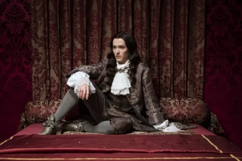 The King’s brother, Philippe (Alexander Vlahos), is NOT happy that his lover, the Chevalier, is in exile.