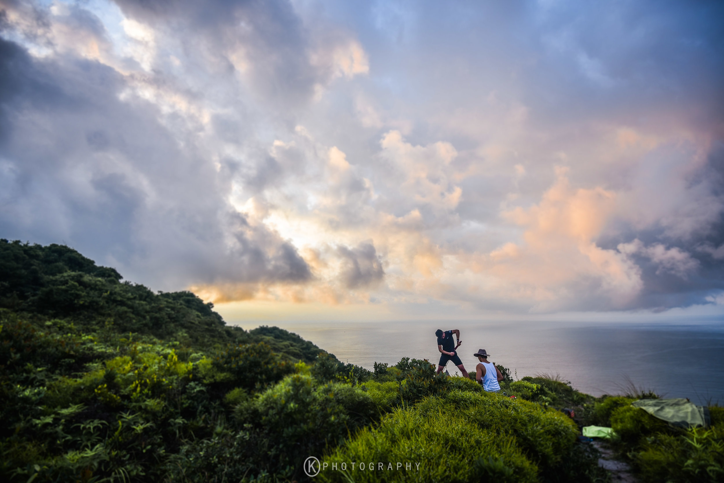 Rosy clouds roll low across the pacific as @jeffreyfungg and @_kingchan_ take down their tent. Most people who don’t know Hong Kong well will say it’s a busy and cluttered city – maybe that’s true – but they have no idea how easy it is to get away from the crowds and spend a night outdoors! The wonderful hiking and photography community here makes getting outside all the more fun!