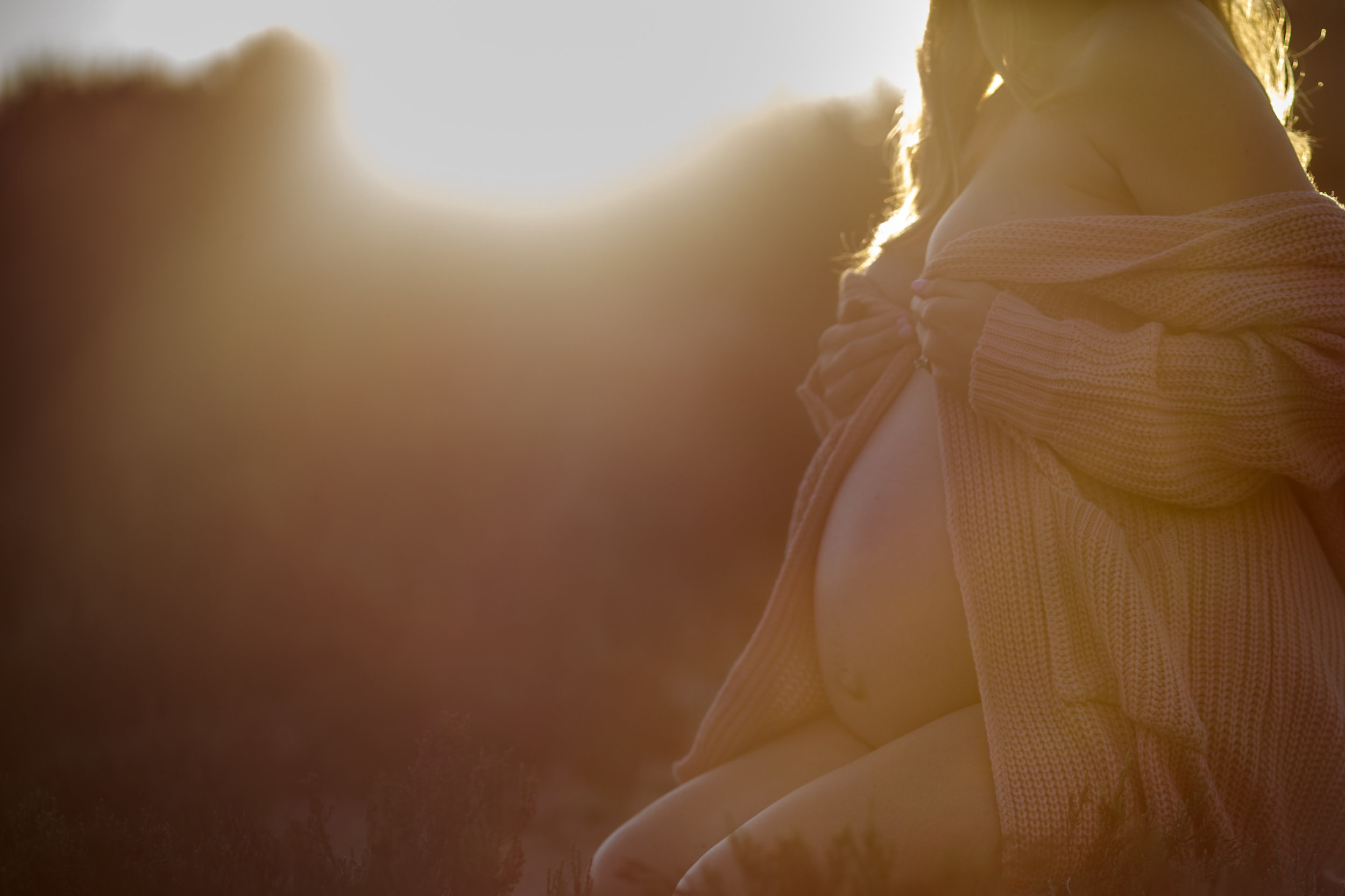 bodouir maternity session with expecting mom and sunset in background