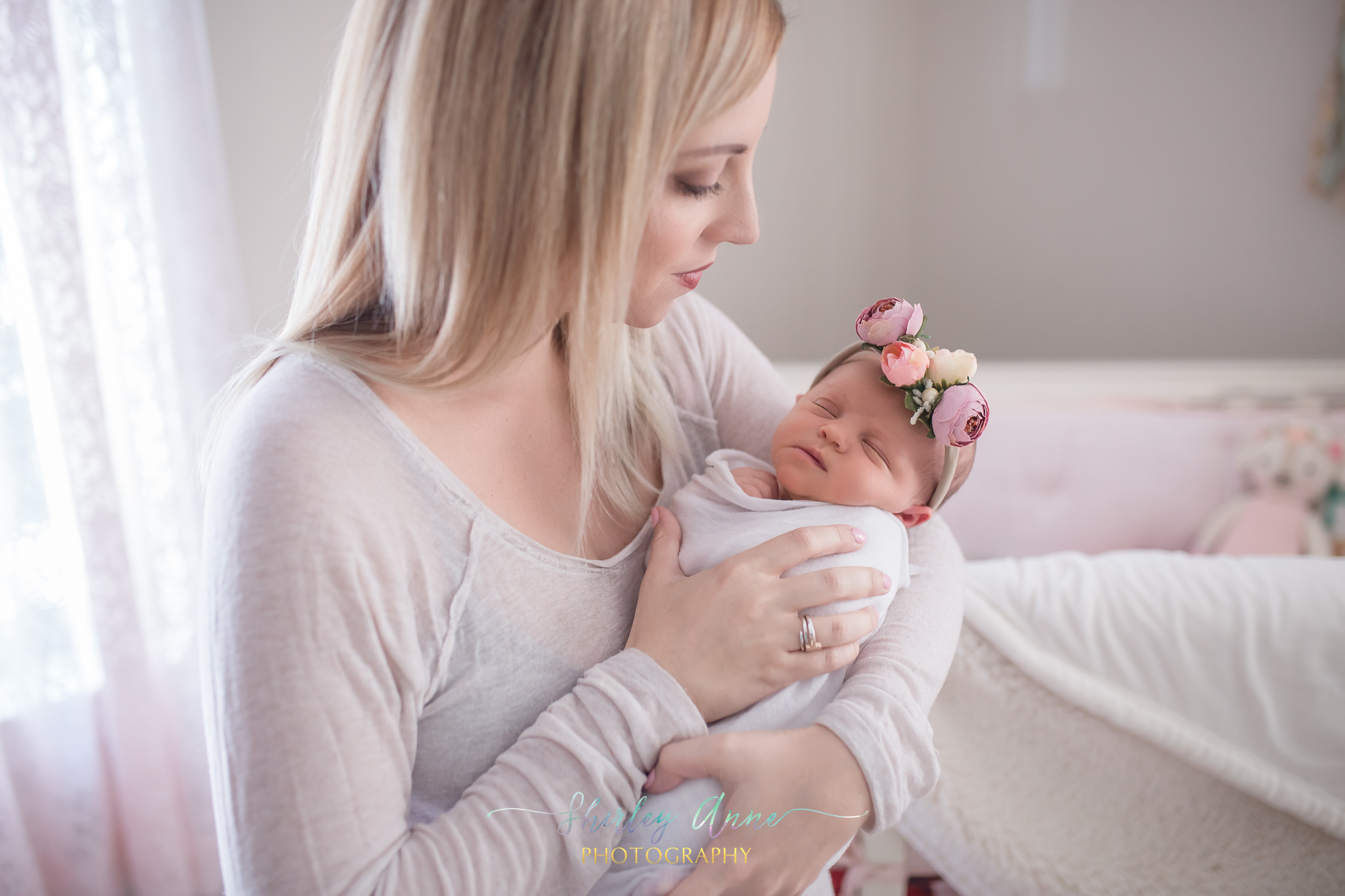 studio newborn photo shoot with mom