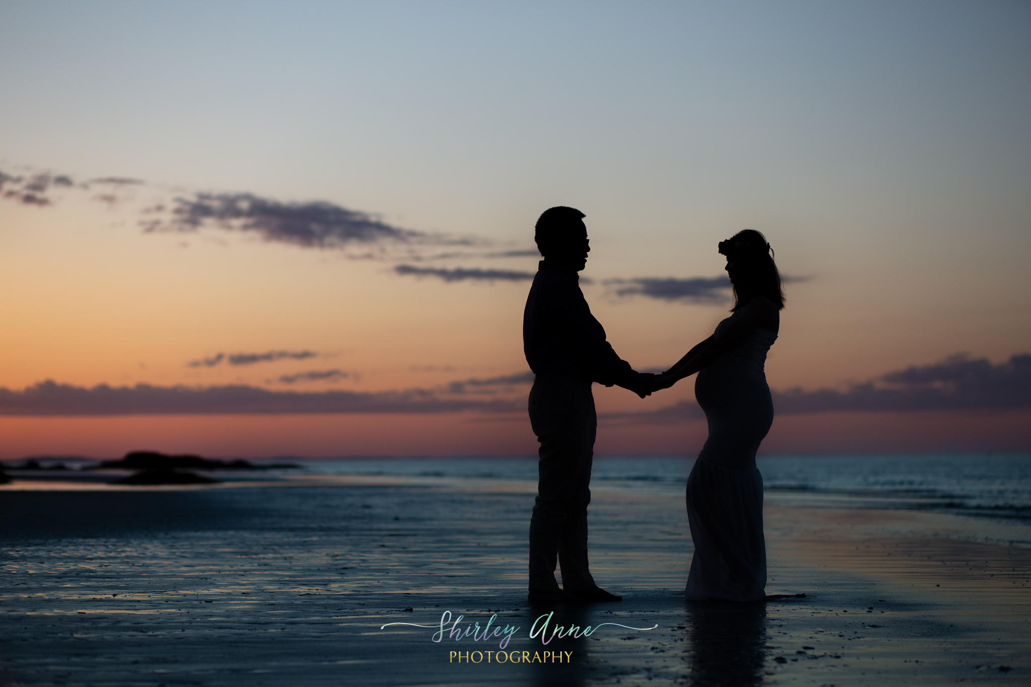 beach silhouette maternity session