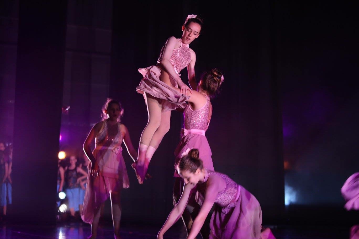 I use lifts and movement from my professional choreography to challenge students.