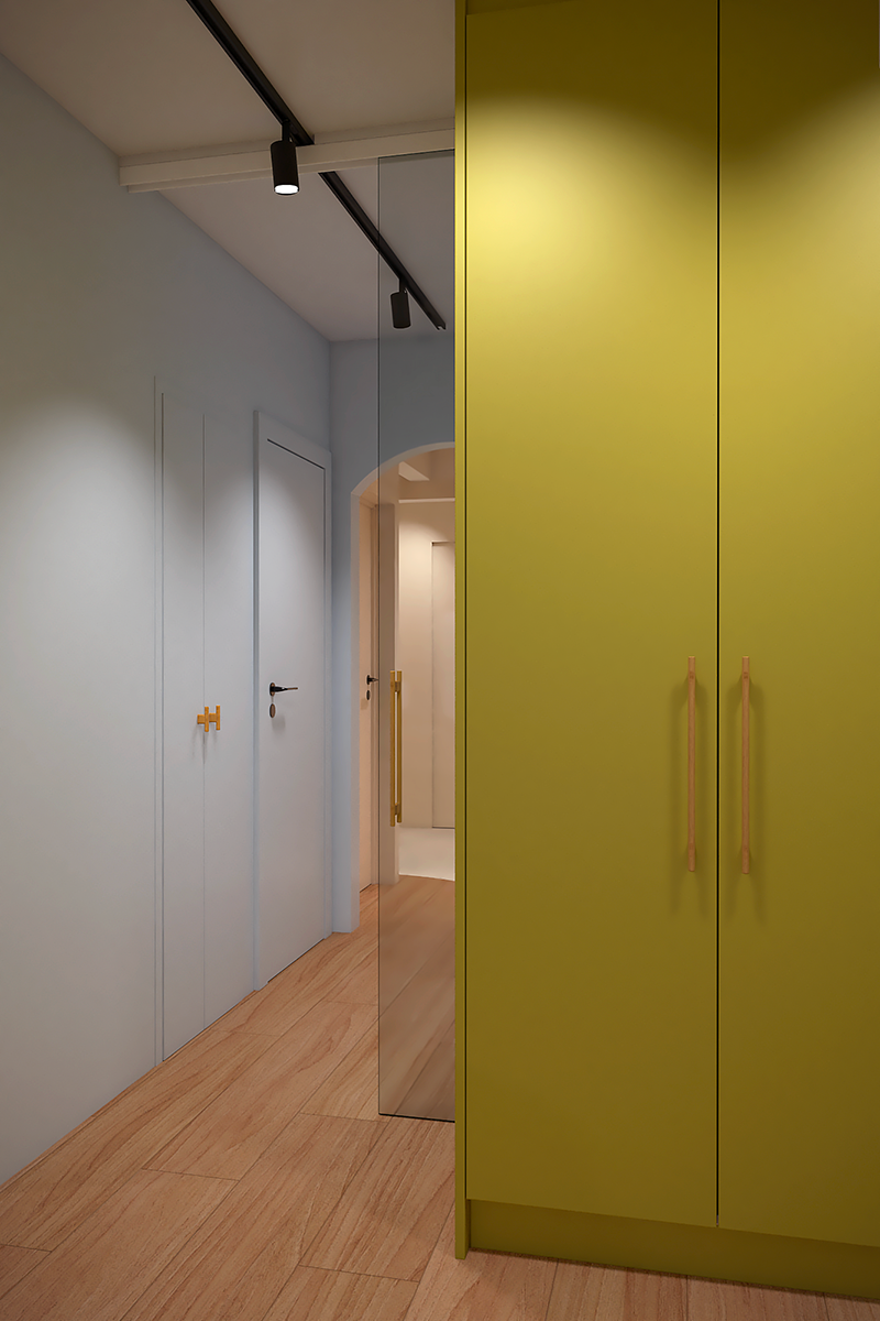 Porte coulissante vitrée à galandage séparant le séjour du couloir pour optimiser la luminosité