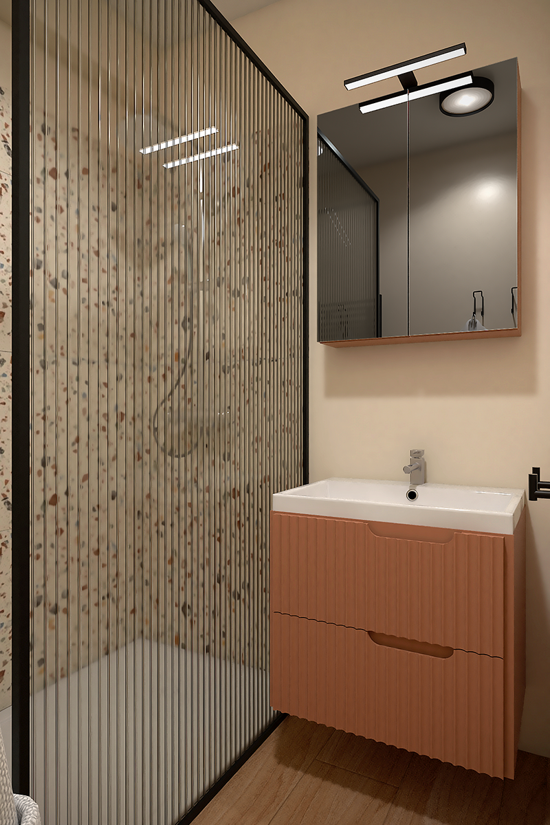 Salle de bain moderne bord de mer avec douche en carrelage effet terrazzo et petit meuble vasque couleur corail