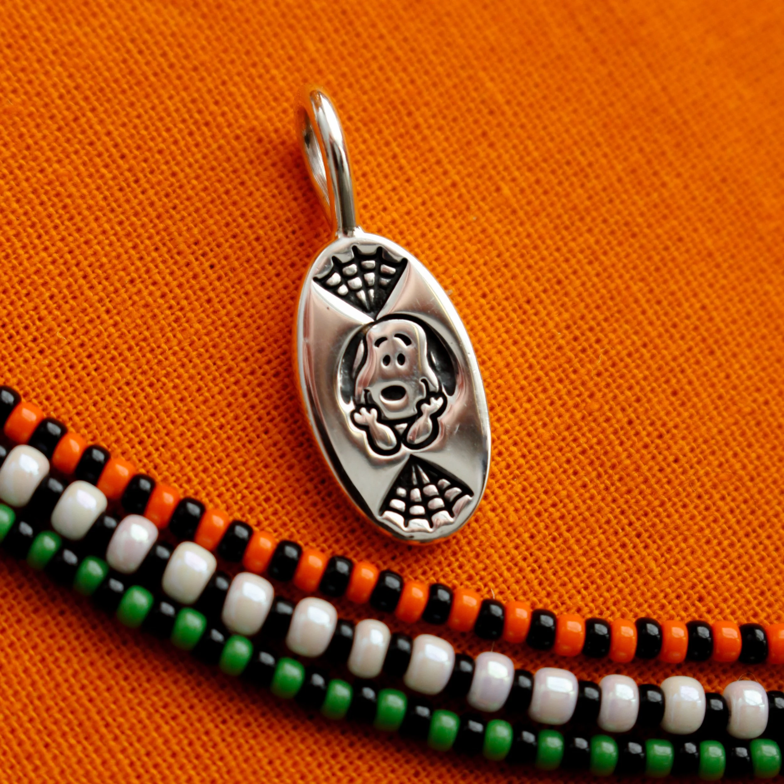 Lucky pup oval web charm