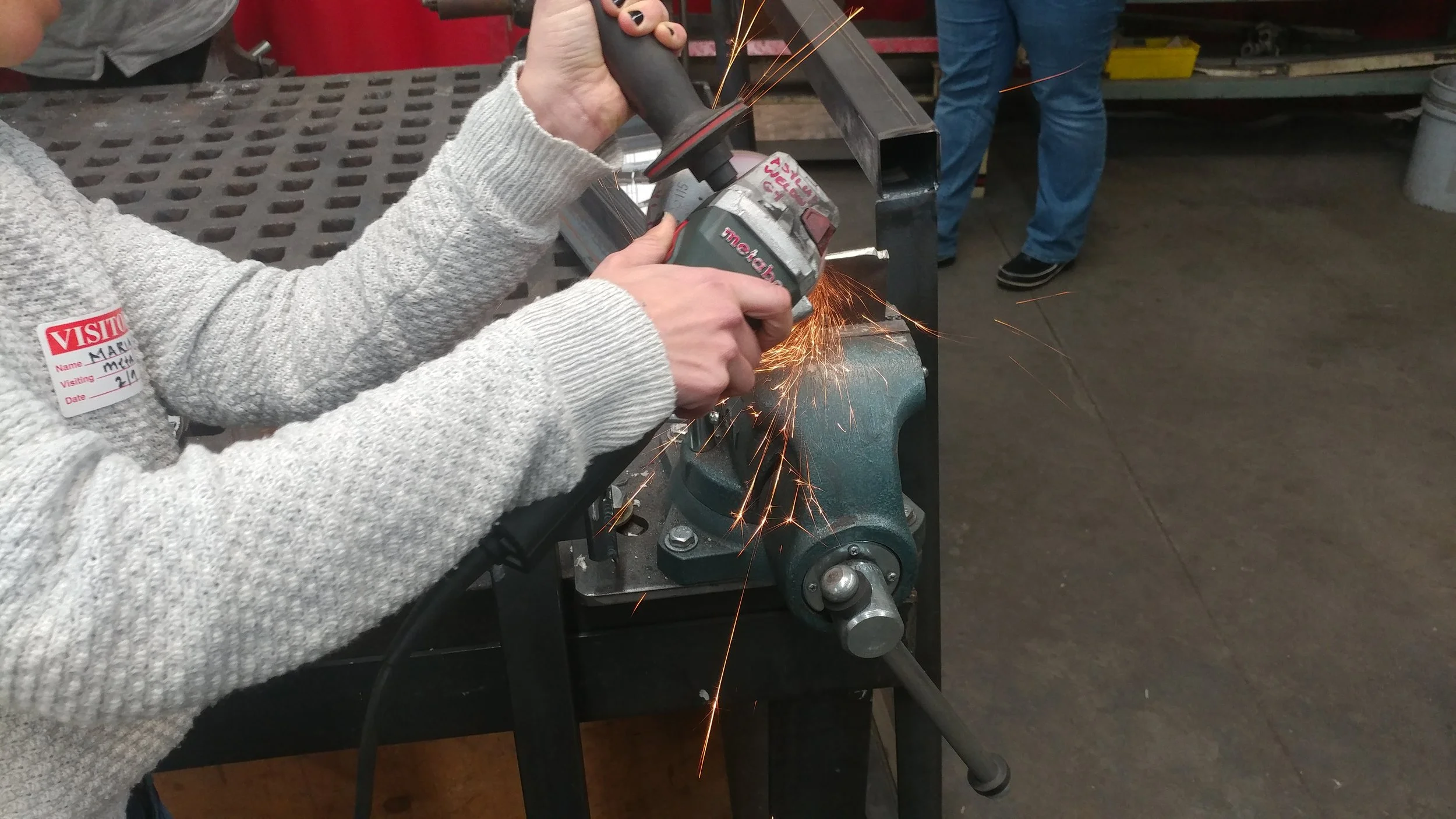  Student learning use of a 4.5” angle grinder 