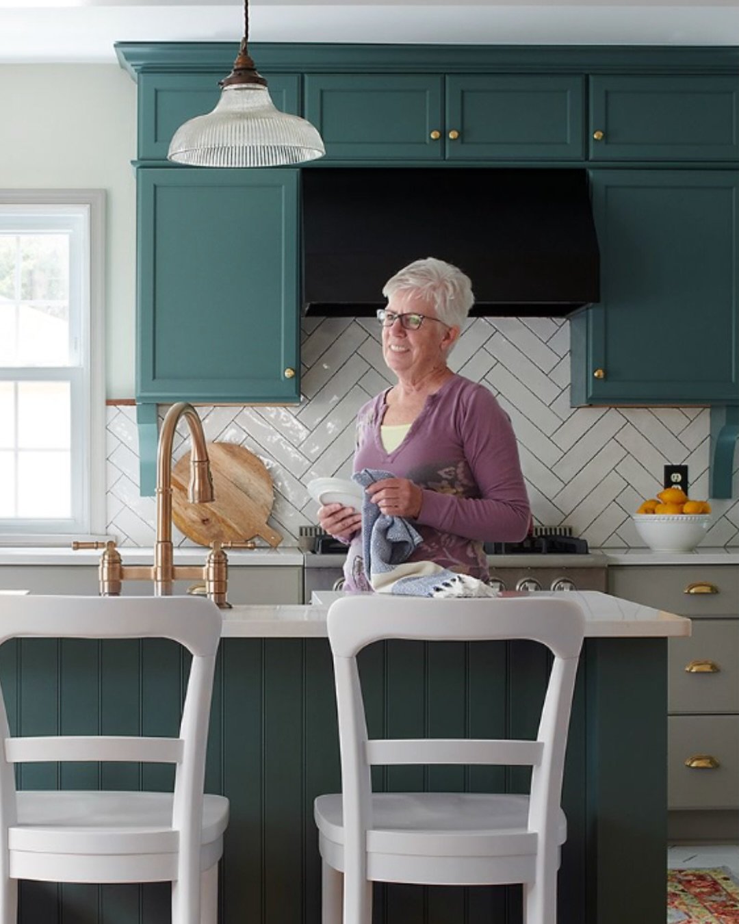 This home was thoughtfully designed with aging in place in mind, keeping both function and flow at the forefront.
 Wide kitchen walkways make moving around easier, while the primary bathroom was relocated to the first floor and upgraded with a spacio