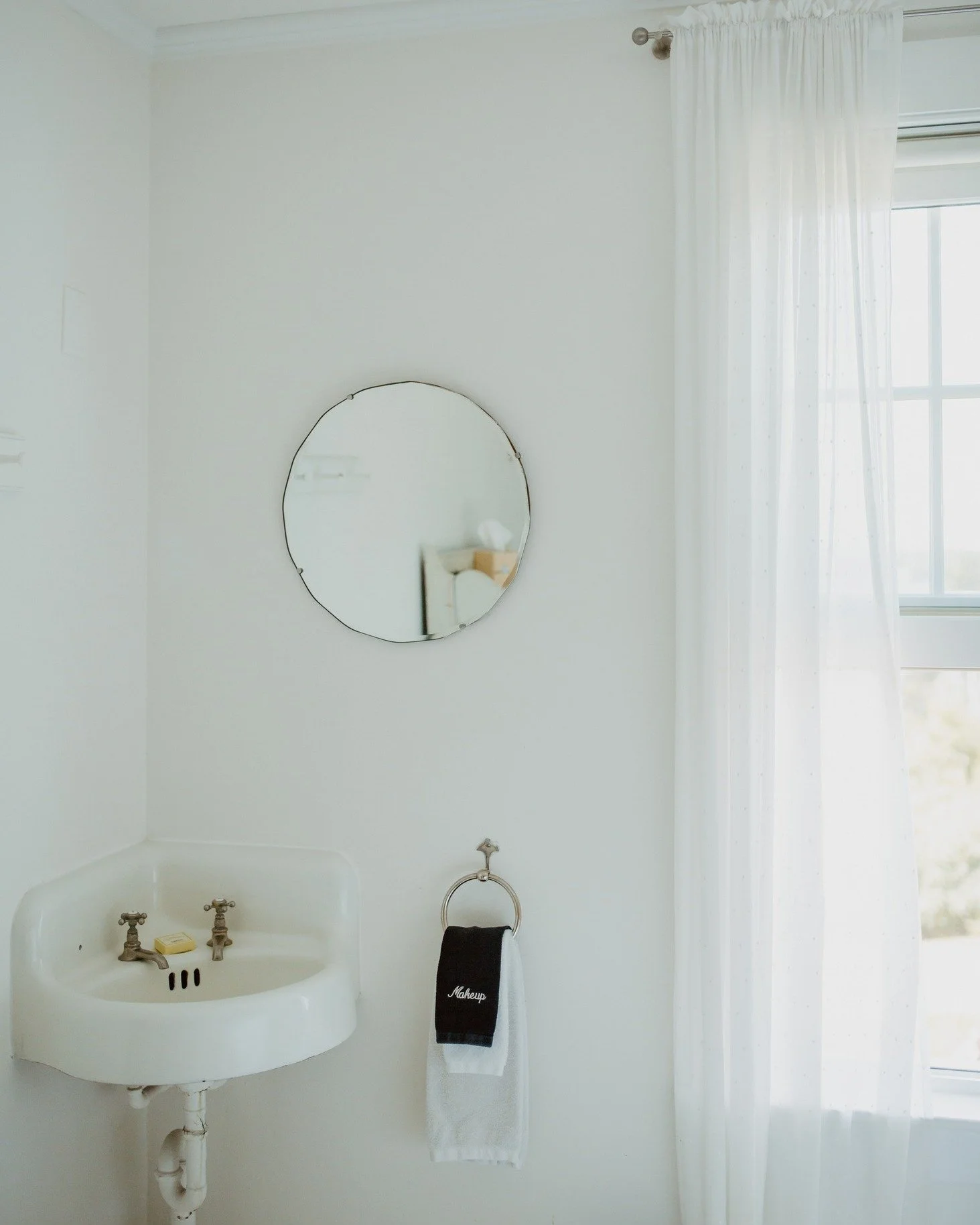Each room carries its own story of old coastal charm &mdash; soft light, breezy curtains, and details that feel both timeless and welcoming.
