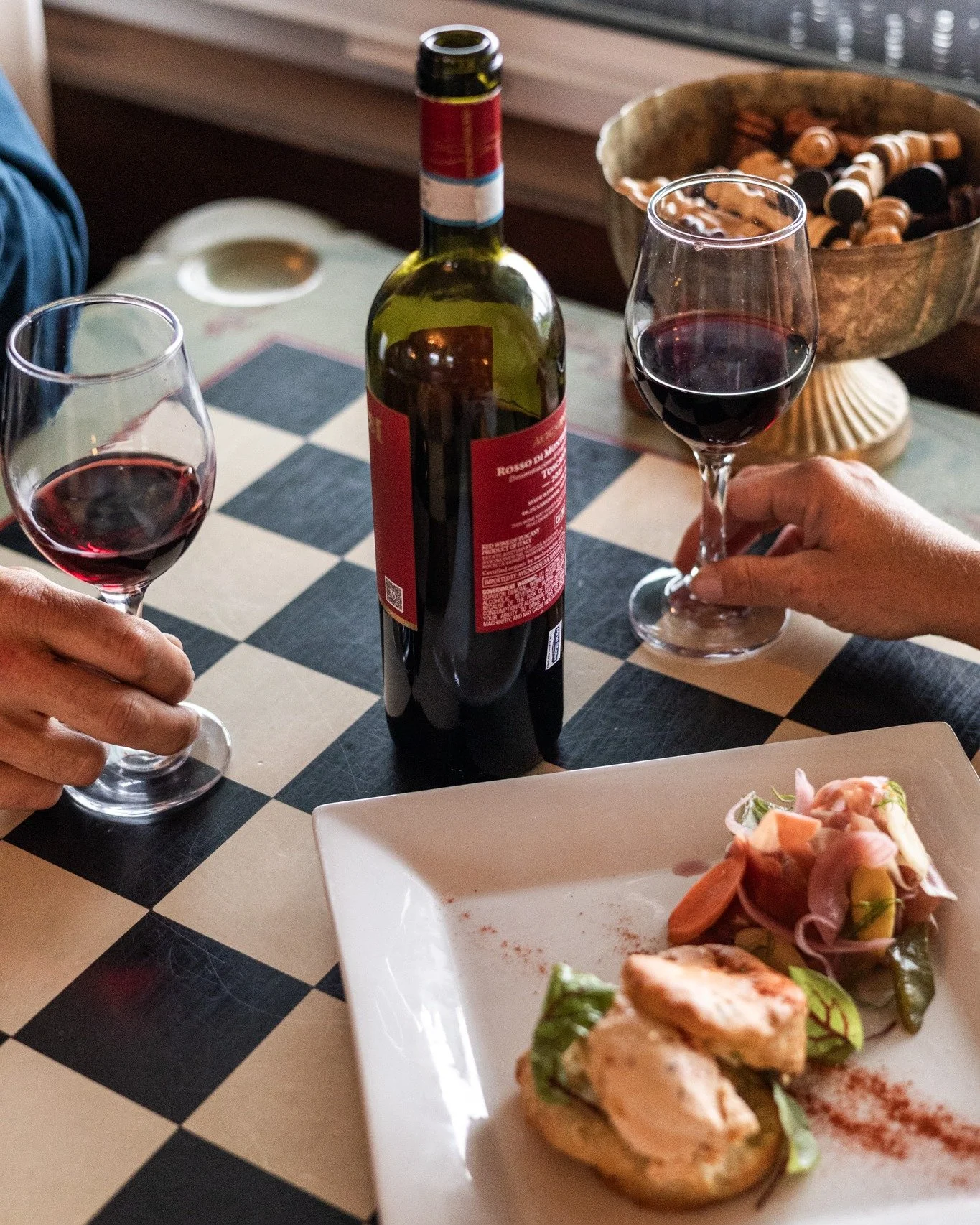 Two glasses of red, something to nibble, and nowhere else to be &mdash; evenings like this are what island nights are made of.
