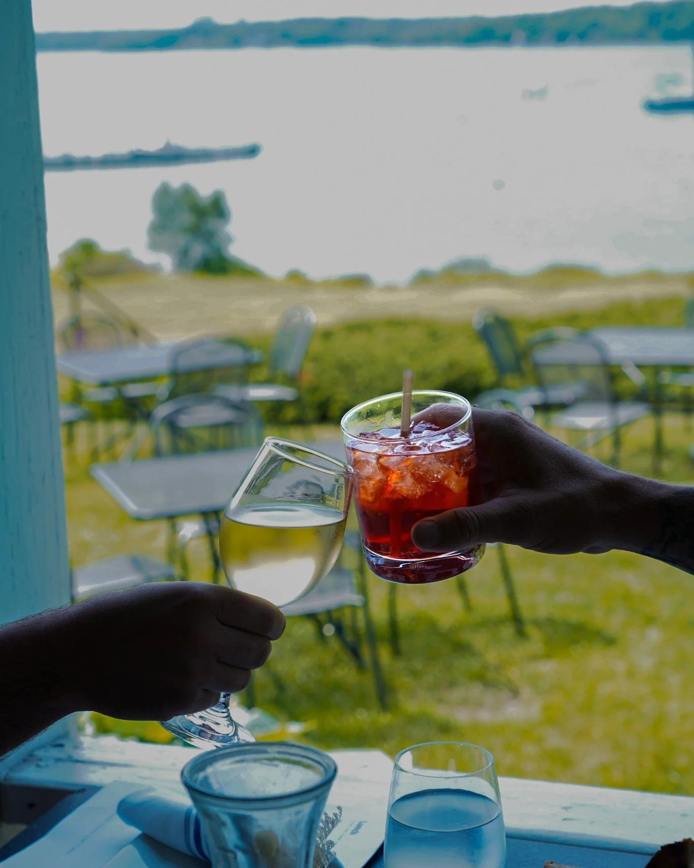 Porch cocktails and a view like this are all part of the ritual at Chebeague Island Inn.