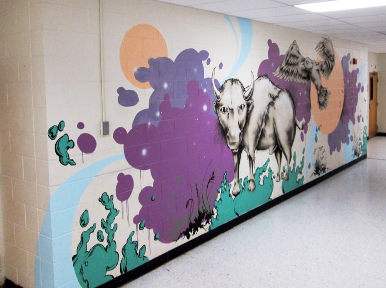 Mural painted at Wounded Knee district School in Manderson/ Pine Ridge, SD
