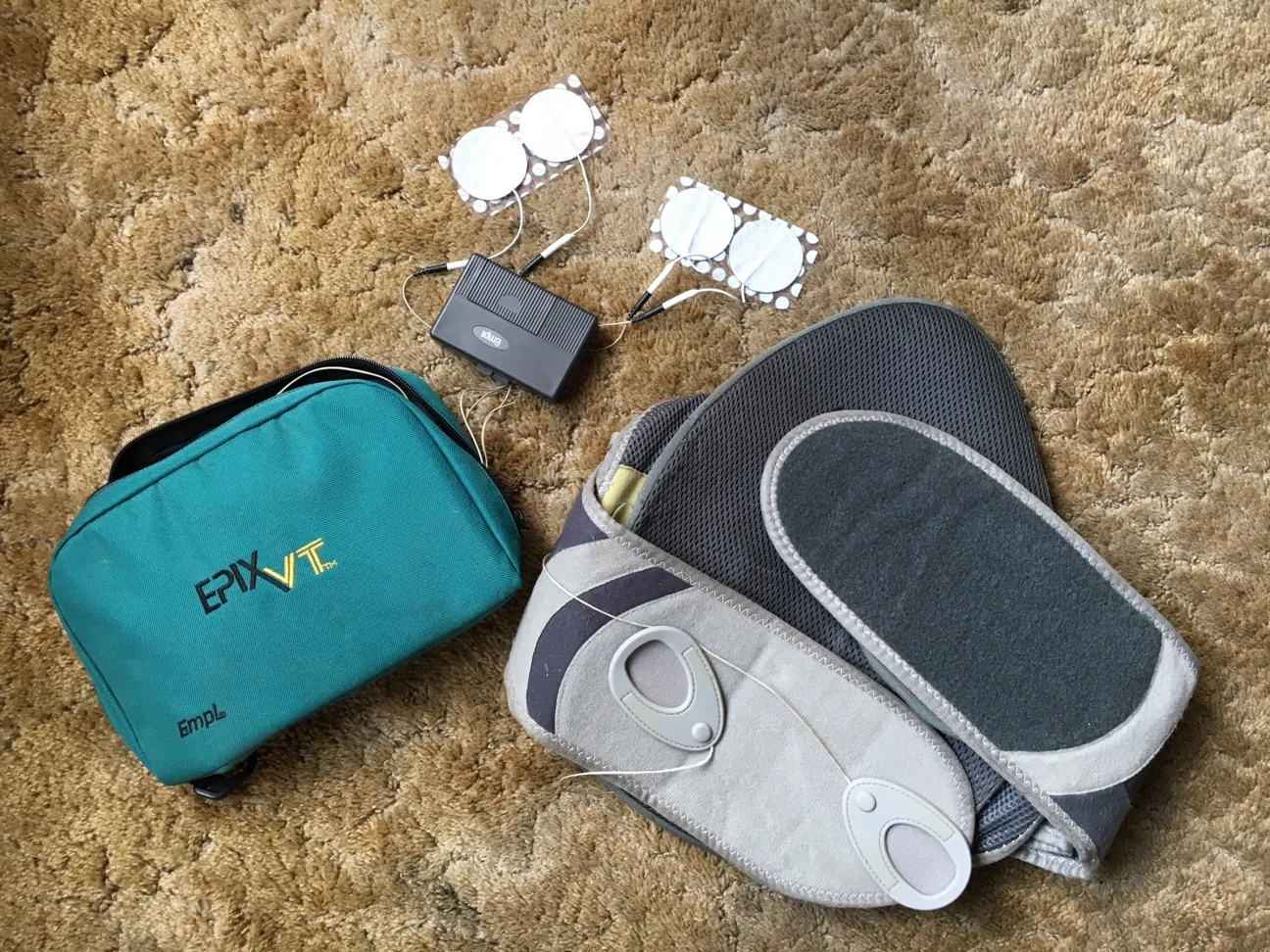 Carrie used to need a portable TENS unit (which stimulates nerves) at home and a back brace at work. (Photo courtesy Carrie Russell) 