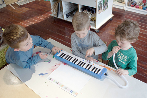 Learning to play the melodica with colour bars children created to devise musical compositions