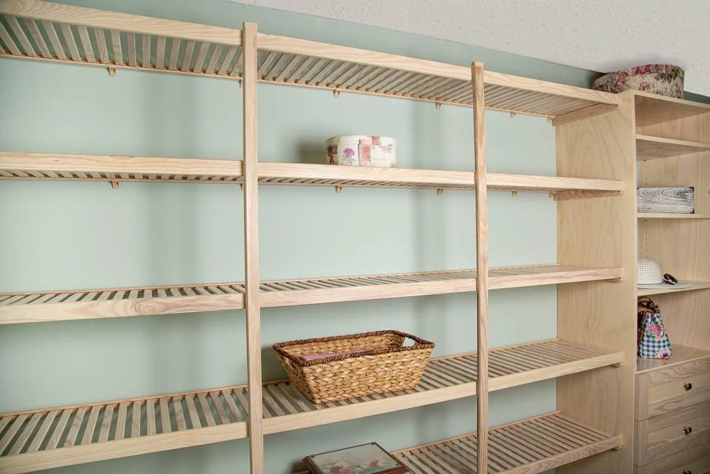Modern closet shelves made with natural wood and durable finishes for long-lasting storage.
