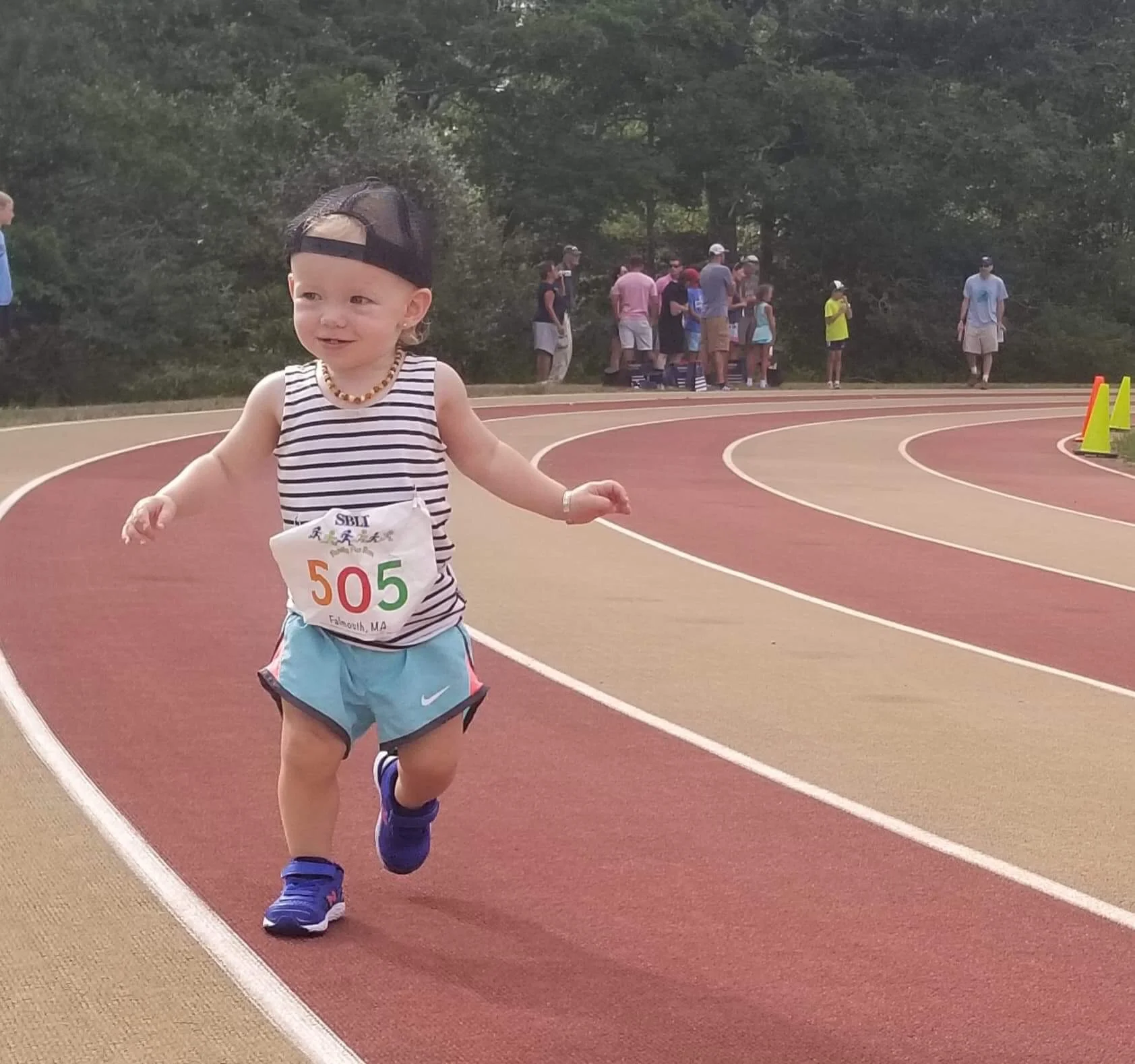 Here’s Scarlett, FIT Founder Kelly McLay’s daughter, on the track and keeping her paces in check. 😉