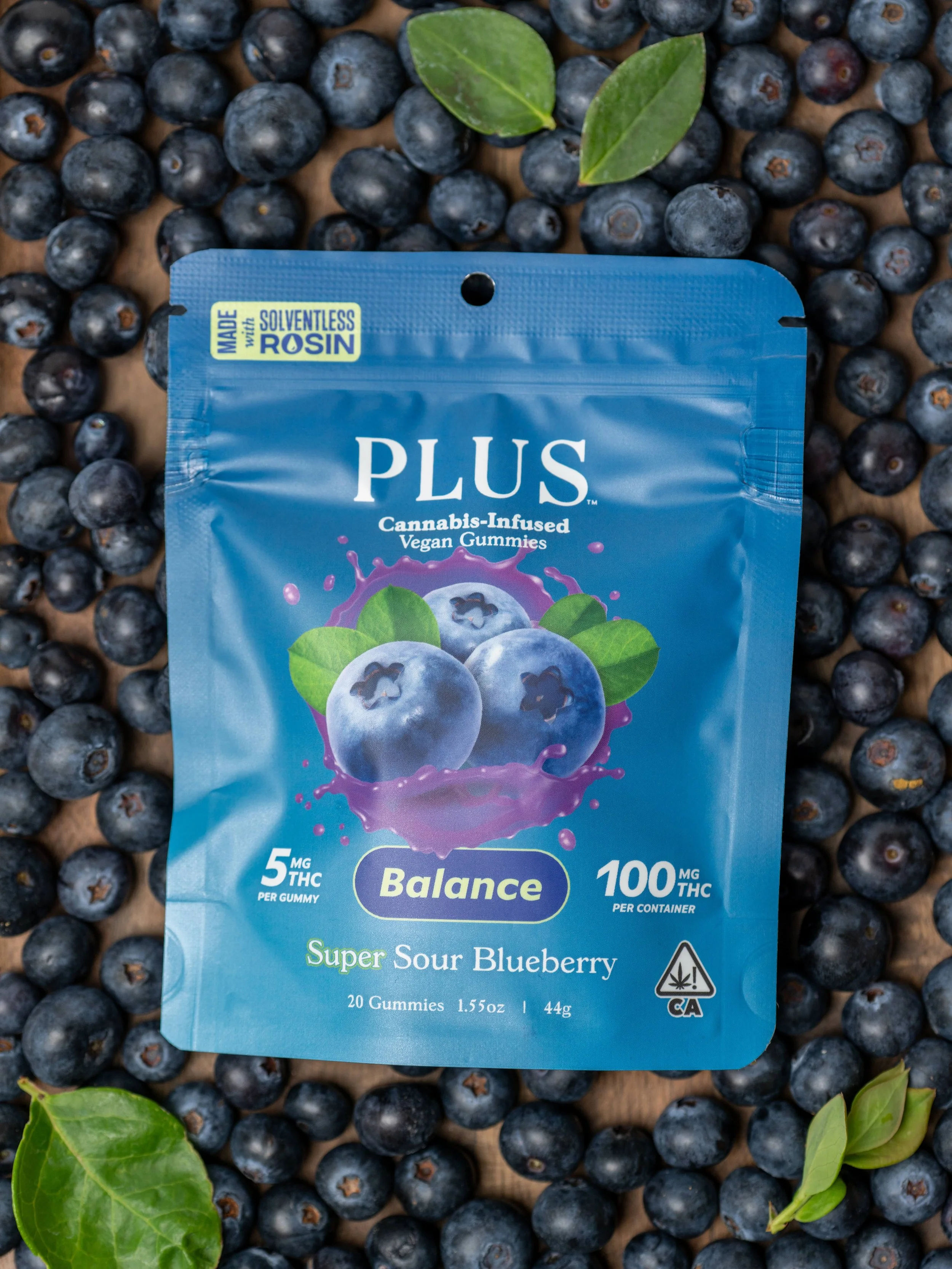 Plus super sour blueberry on a bed of blueberries