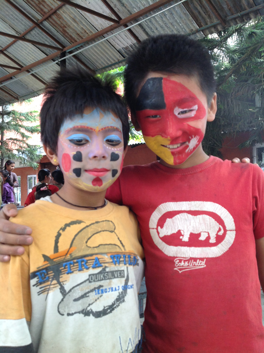 Anup and classmate clown around.