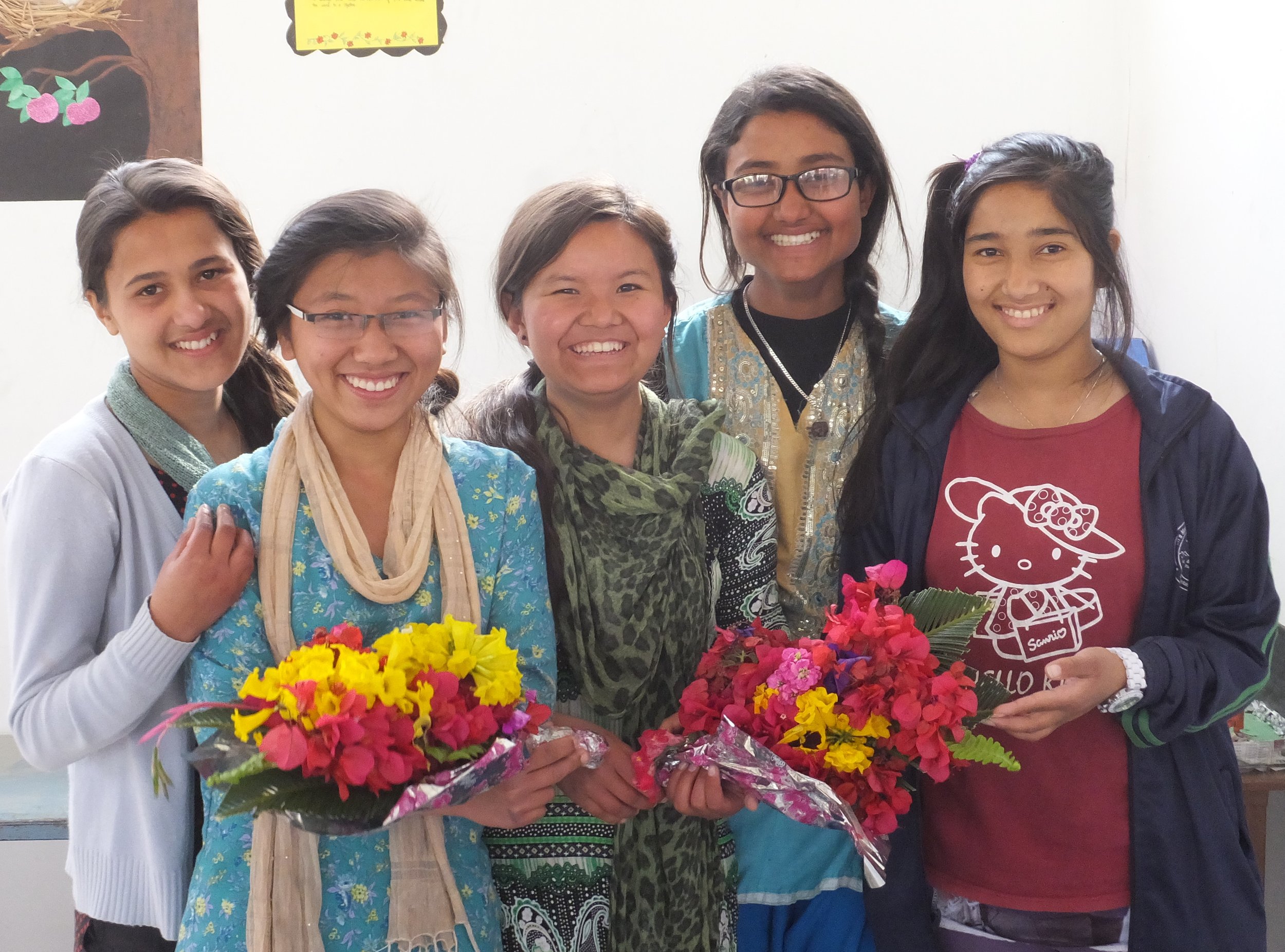 Some of our girls sharing their gift of flowers.