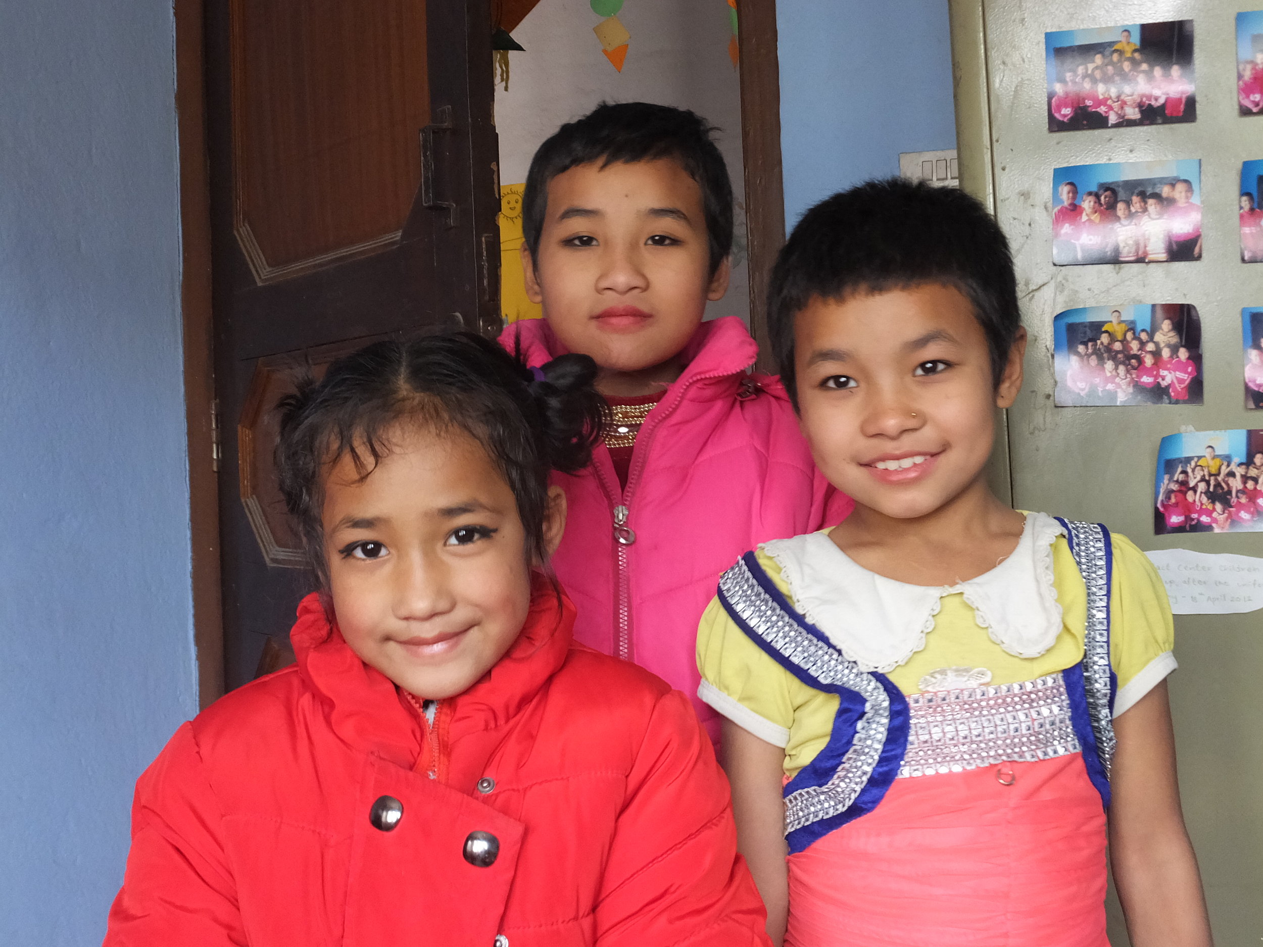 Three girls smiling for the camera!