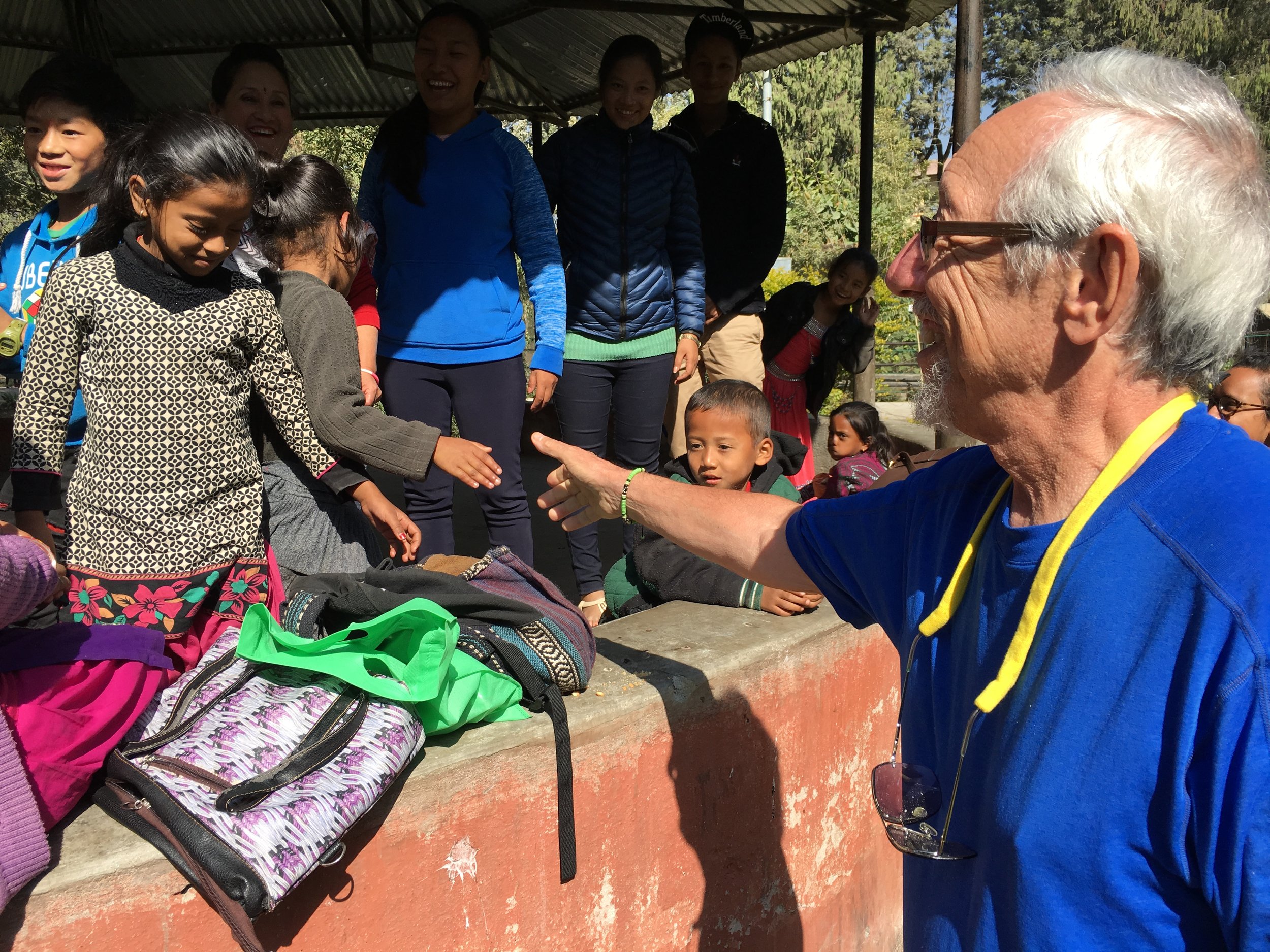Child sponsor Jerry chaperones younger children's field trip to Kathmandu Zoo.