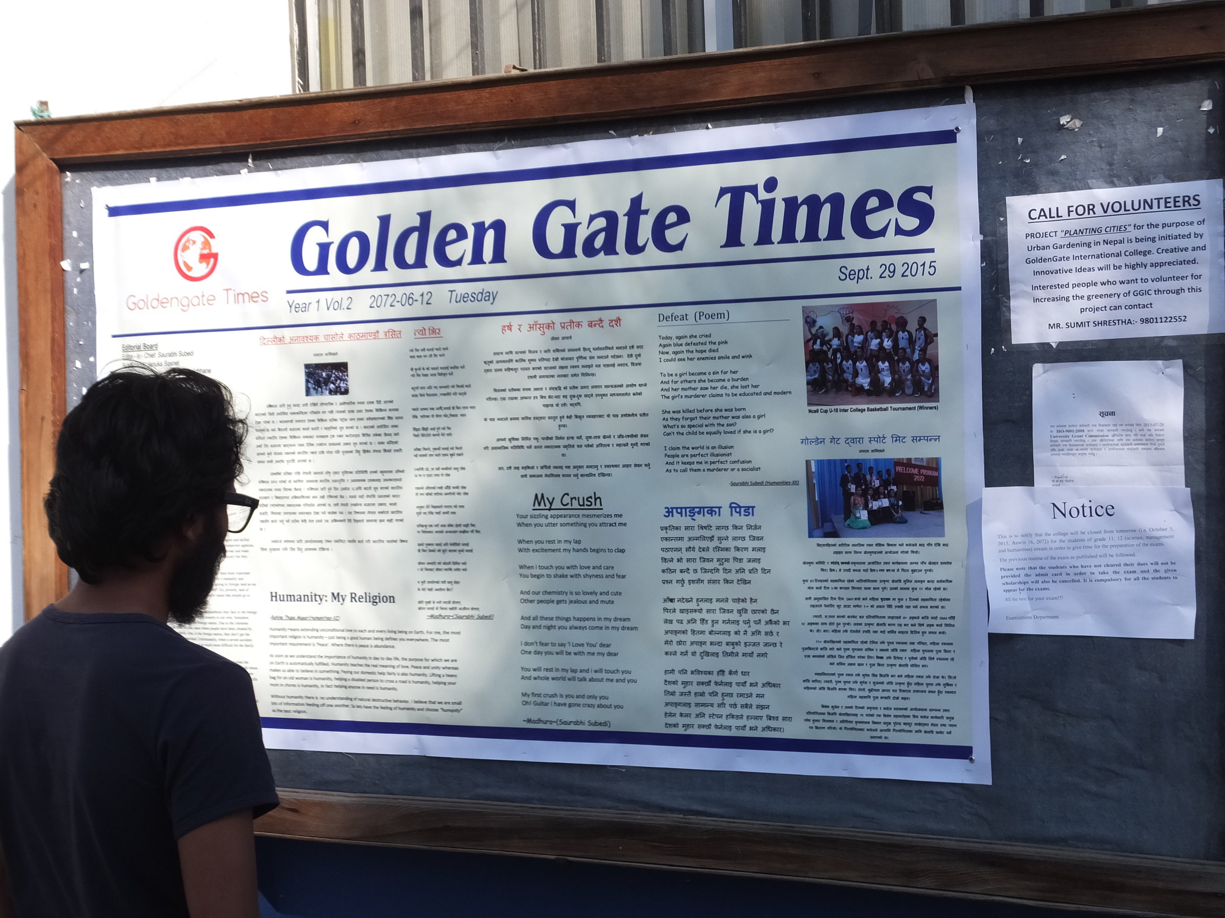 Rukesh reading the latest news at Golden Gate College where many of our children attend 11th/12th grade.