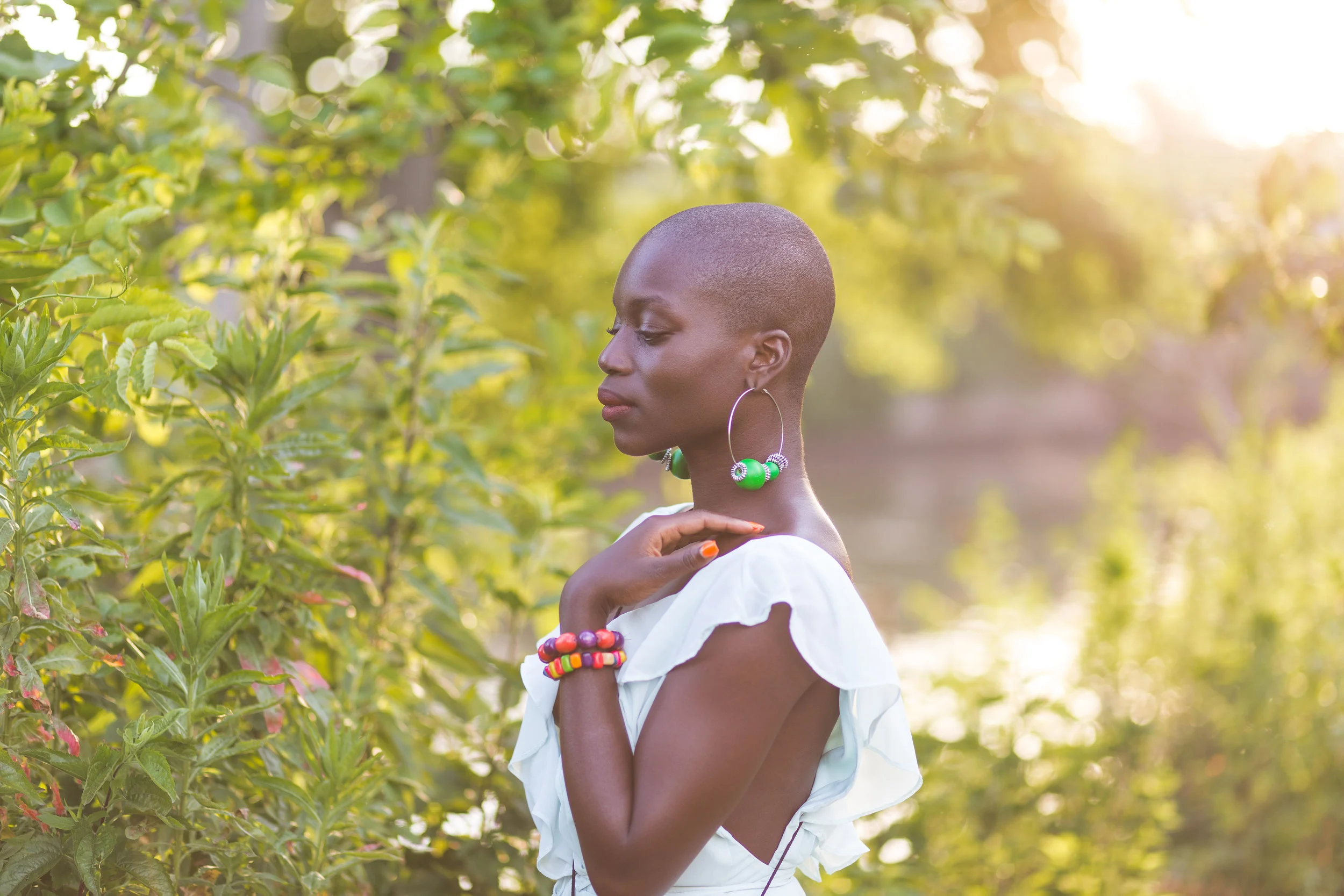 Abena Bempah walked into the beer garden where we met for drinks and the entire place turned and looked at her. Her confidence and smile draws people in and leave you wanting more. She is on a journey to 'discover beauty within and without' and has been inspiring others to travel and redefine beauty. In the past few years, Abena has intentionally crafted her life around travel. She has been to beautiful intriguing places around the world such as Aruba, Turkey, UAE, Thailand, Holland, Croatia, Morocco, Italy and Columbia; the majority of her trips were solo. On her recent trip to Turkey, her mother tried to persuade her not to go due to security concerns, offering to reimburse the cost of the ticket. Abena declined and had the trip of a lifetime. "If you think adventure is dangerous, try routine. Its lethal" - Paulo Coelho Abena is a budget traveler, determining her next destination based on the cost of the flight and will fly out of Newark/NY if needs be. Her Instagram has the most beautiful iPhone selfies incorporating the essence of the locations. It is worth stalking and it is also a reminder that you don't need a big camera to take compelling photos. Below are some of the gorgeous photos of Abena I captured when we met. 
