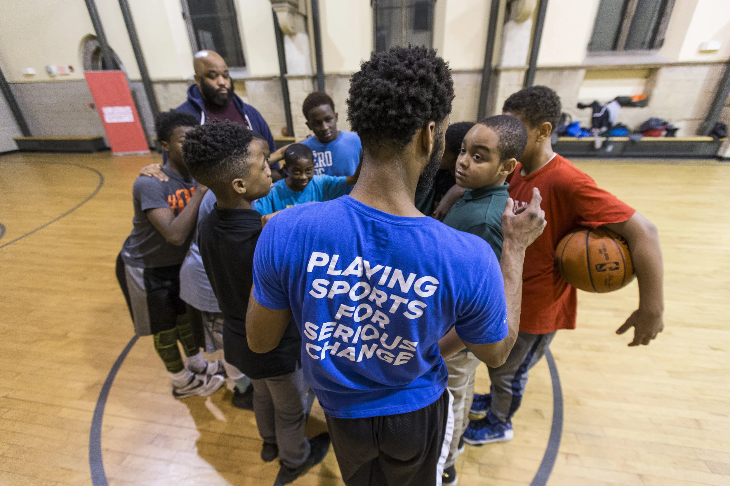 Basketball-Coach-with-Huddle.jpg