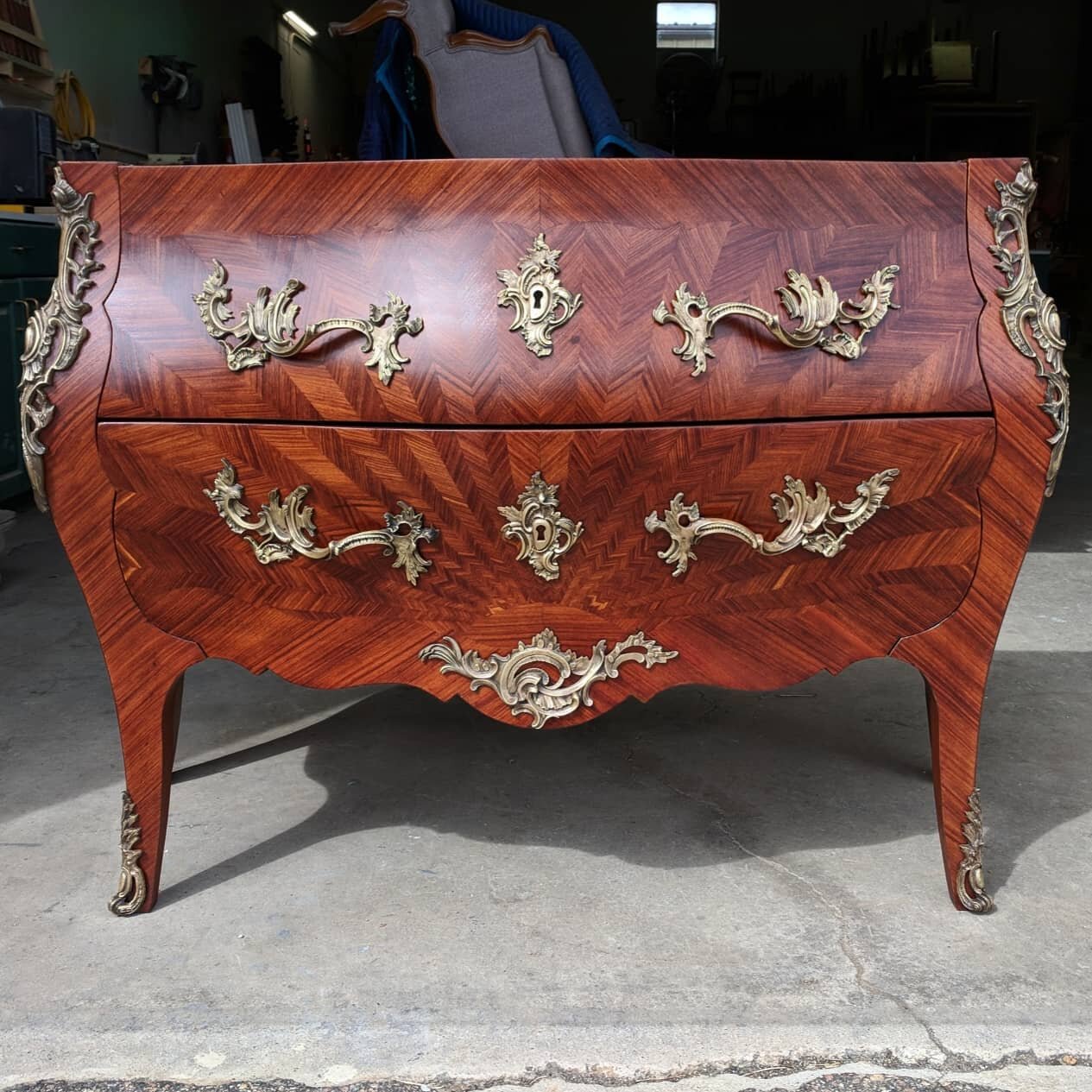 Transformation! (Scroll ---&gt;)

Check out this stunning antique bombe chest we had the pleasure of restoring.

As you can see, this item came to us in very poor shape. We took the time and care needed to repair the delicate veneer and assure this l
