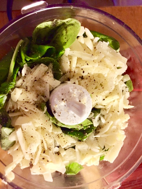 Puree the ingredients into a paste consistency. Put Pesto aside.