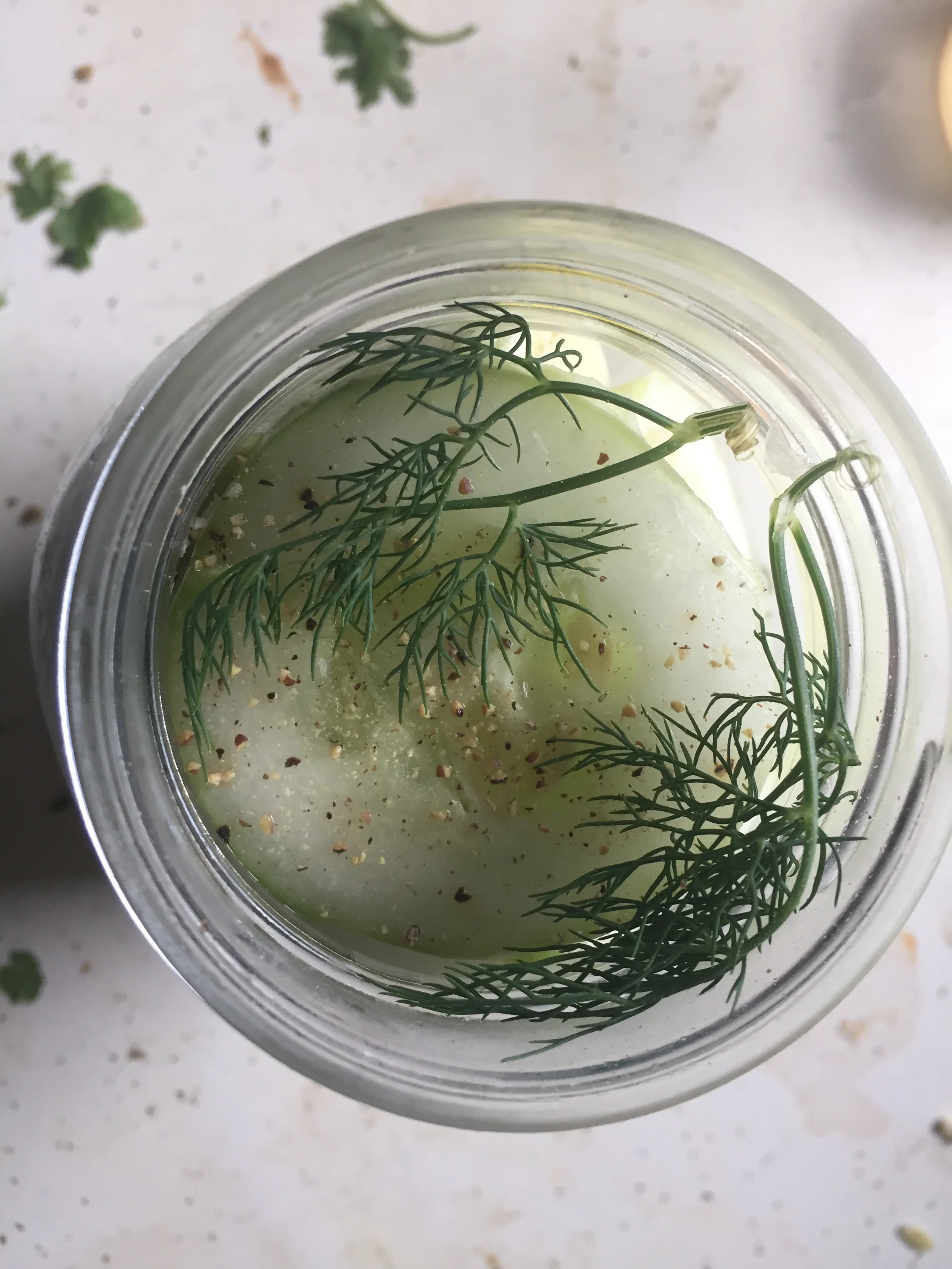 Crush black pepper into the cooled brine. Pour the cool brine into the mason jars so the brine goes up to the top of the jar. Put the lids on and refrigerate in the fridge for 3 days.&nbsp;Optional: Spicy garlic dill pickles (see below)