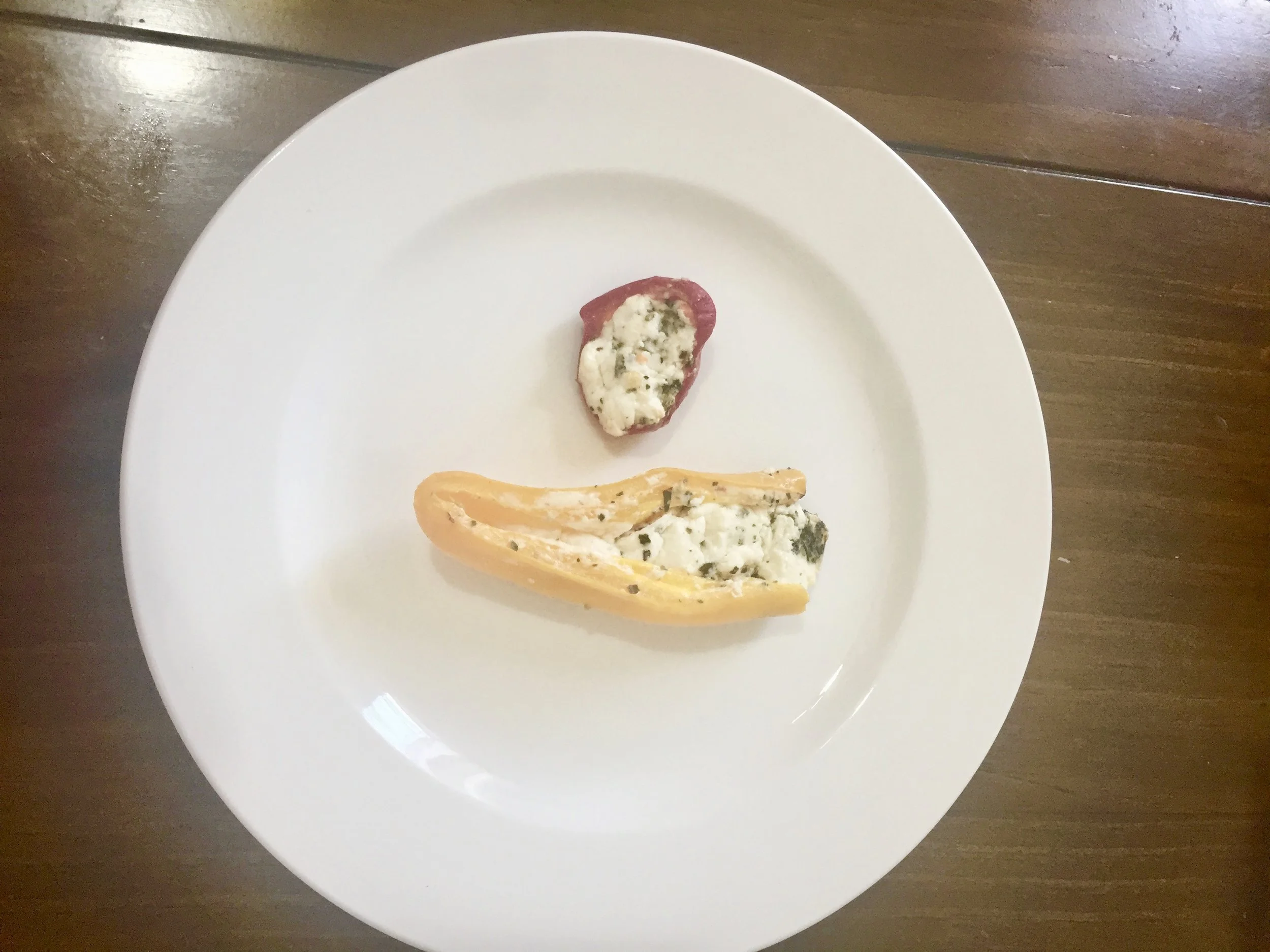 Ingredients Miniature Red, Yellow and Orange Peppers A Log of Herbed Goat Cheese Honey Olive Oil Salt and Pepper